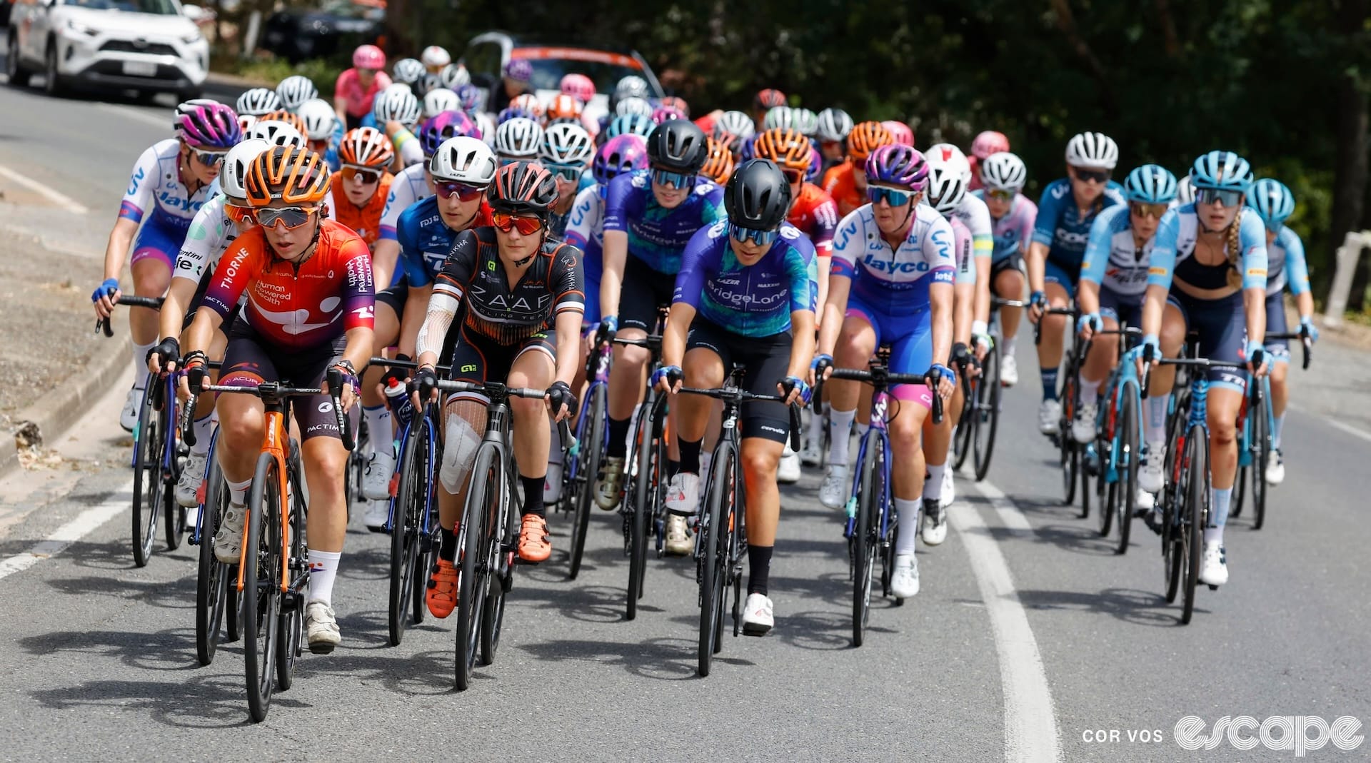 Kaia Schmid leads a peloton at the 2023 Tour Down Under.