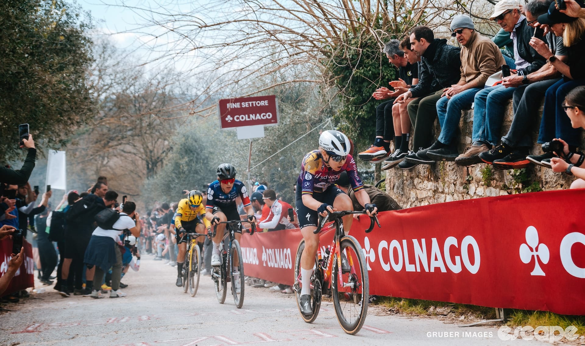 Anna van der Breggen leads Demi Vollering and Pauline Ferrand-Prévot up a climb at Strade Bianche 2025.