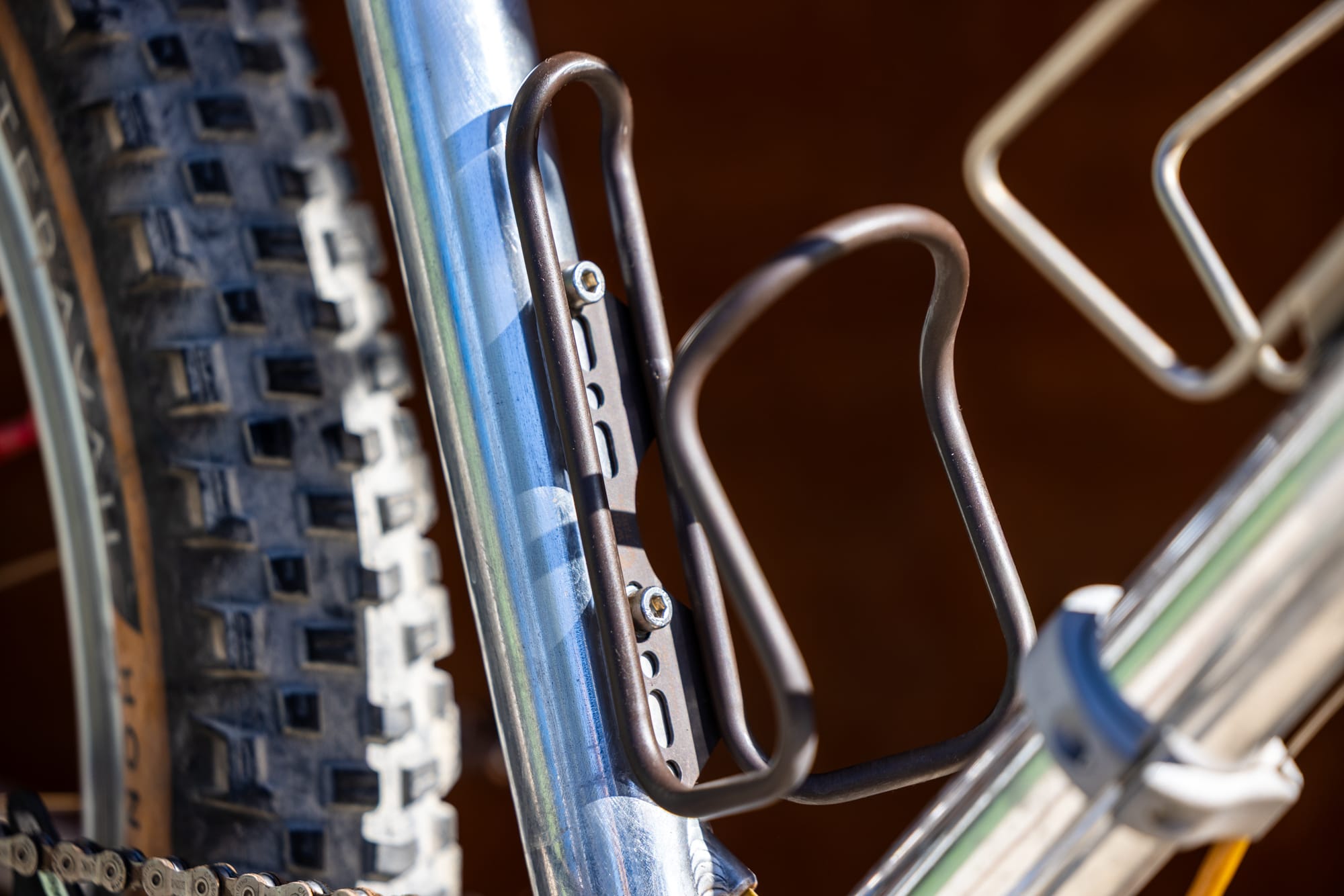 wolf tooth morse bottle cage attached to seat tube
