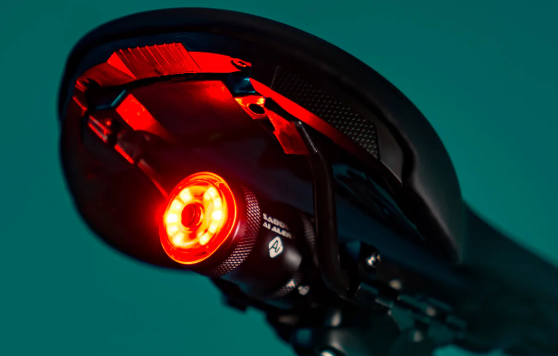 lezyne under saddle light against green background