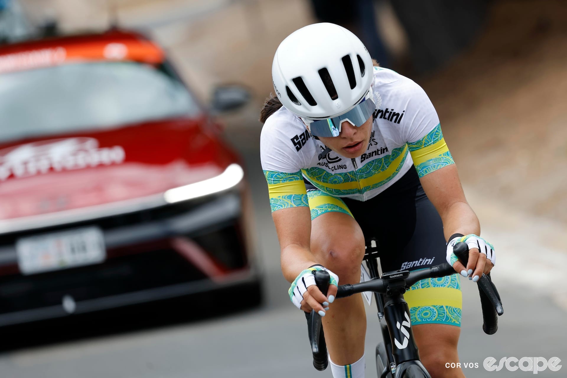 Alyssa Polites sits, exhausted, at the end of a Tour Down Under stage.