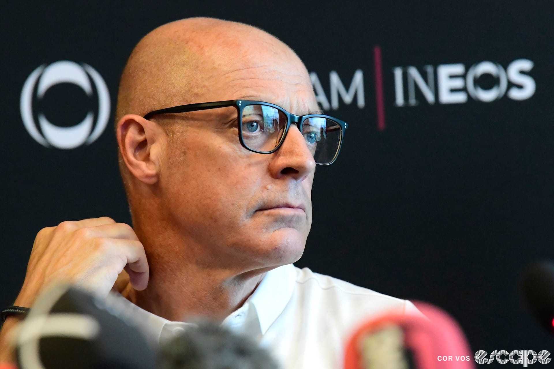 Dave Brailsford considers a question during a press conference for Ineos.