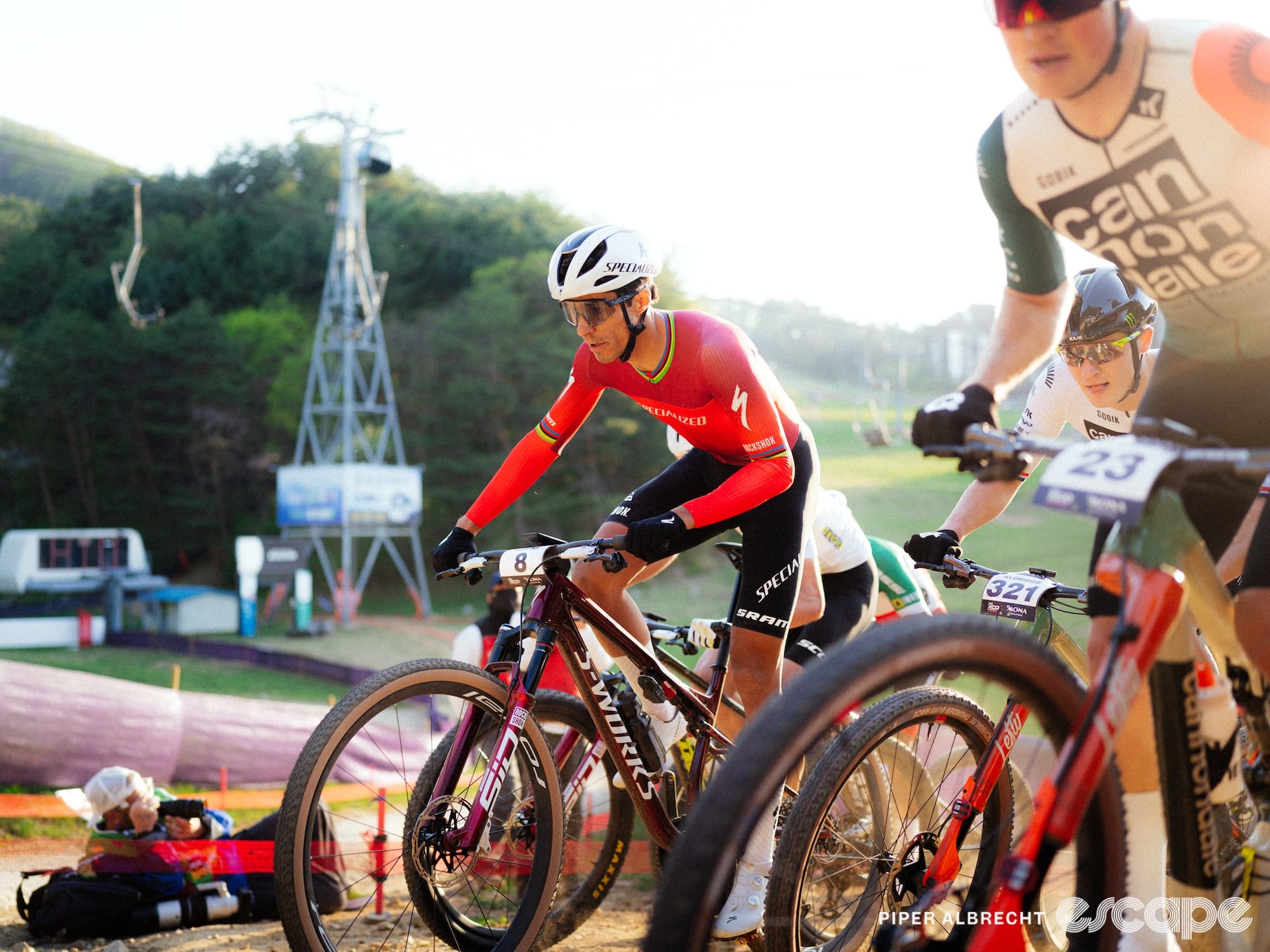 Christopher Blevins rides near the front of the field at the World Cup short-track cross country race in South Korea, prior to his injury.