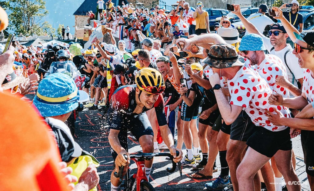 Cycling fans lining the road at the Tour de France