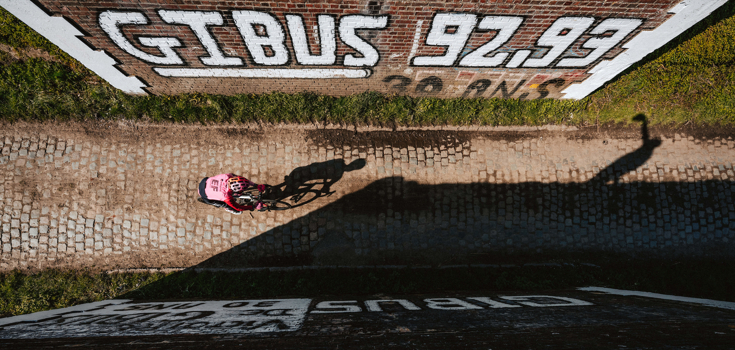 An overhead shot of an EF rider going through the "Pont Gibus" decommissioned railroad bridge, an iconic spot on the course.