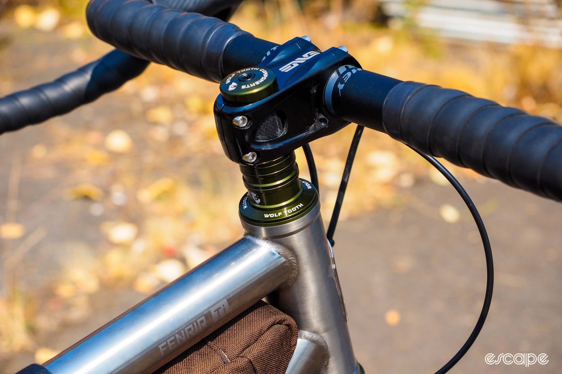 Wolf Tooth Components olive green anodized headset and headset spacers on an Otso Warakin Ti.