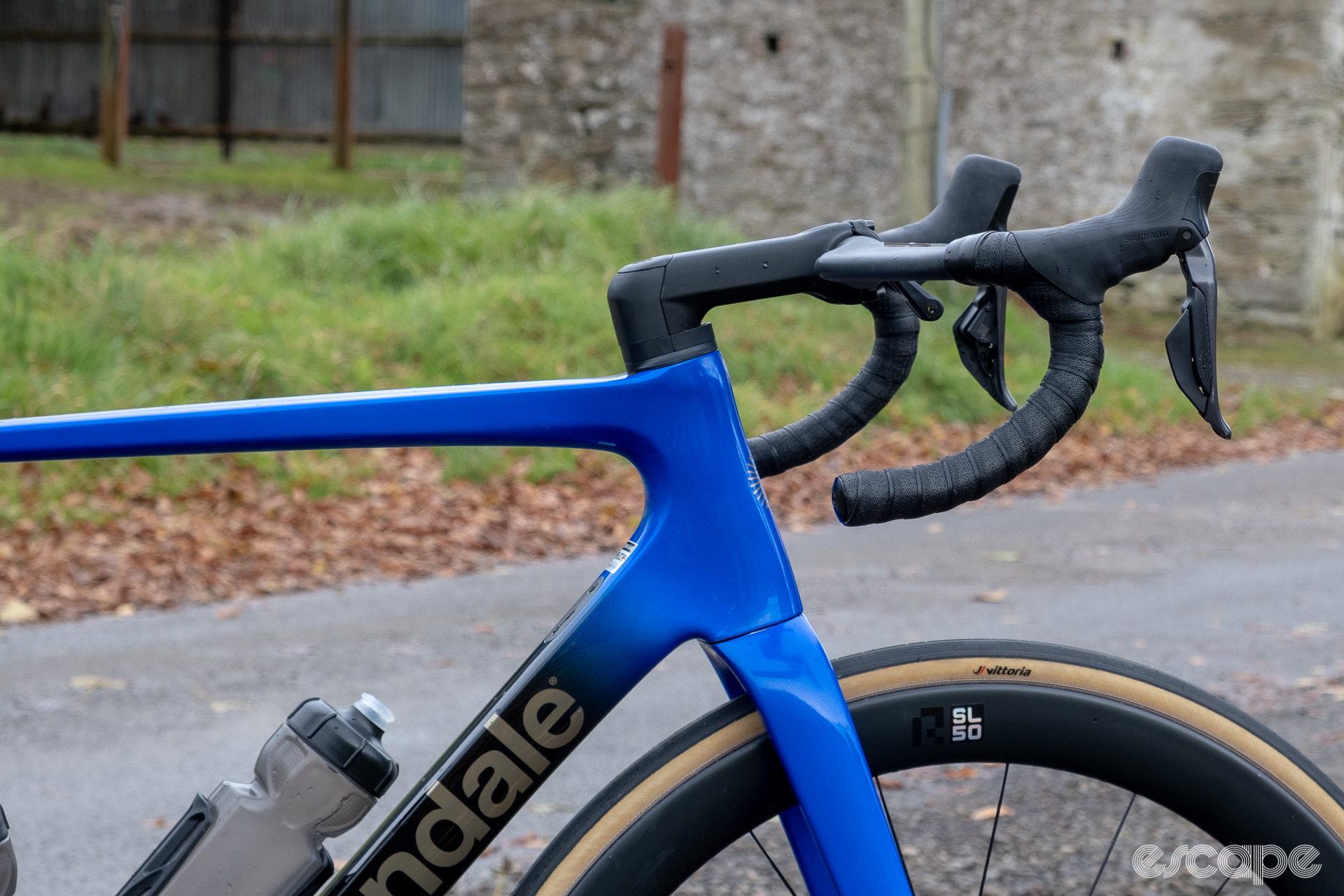 The photo shows the Conceal stem and Vision Trimax Carbon Aero handlebar with internal hose routing along with the top, head, and down tube of a new Cannondale SuperSix Evo Hi-Mod 2.