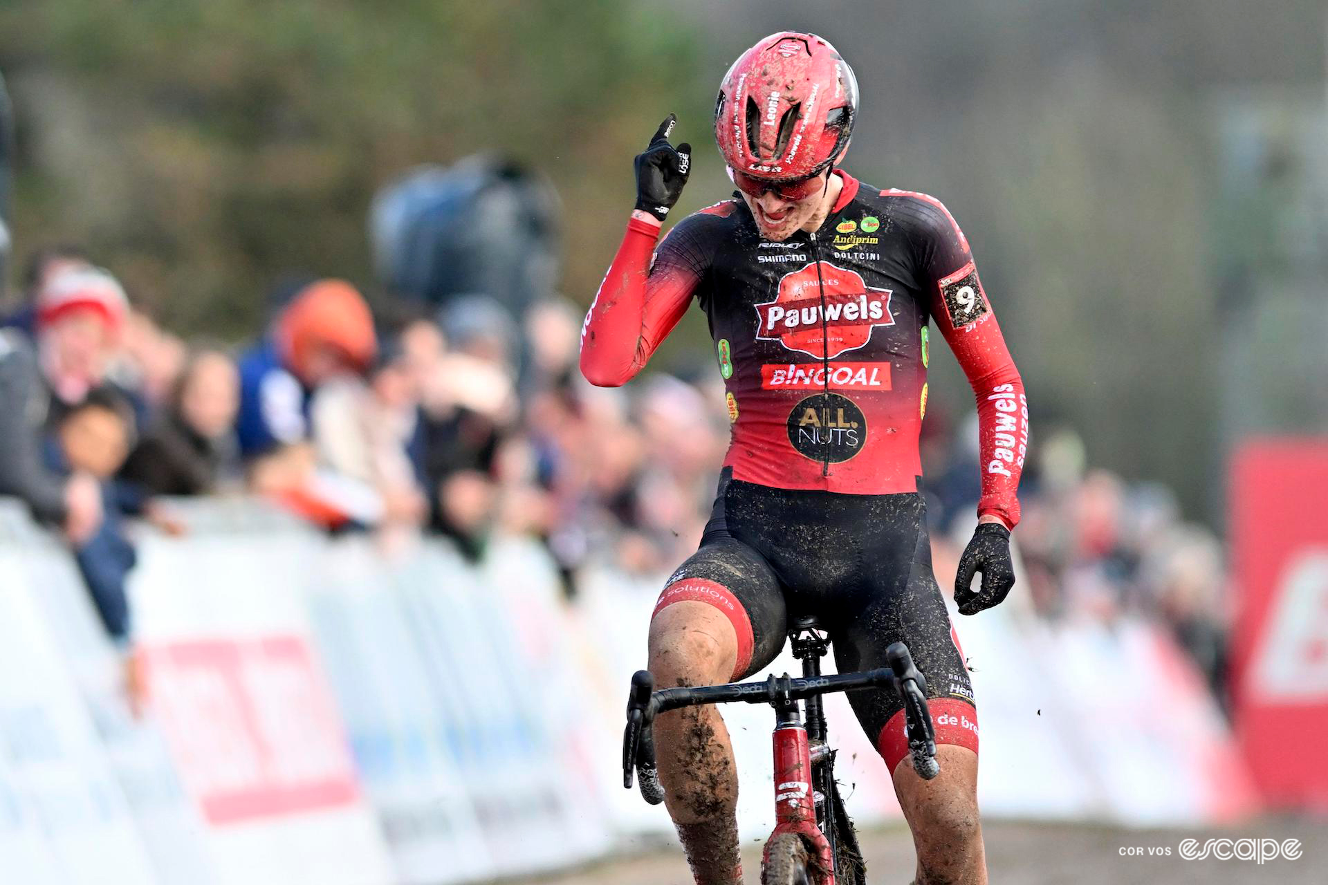 Leonie Bentveld of Pauwels Sauzen-Bingoal celebrates her third-place finish at Cyclocross World Cup Flamanville.