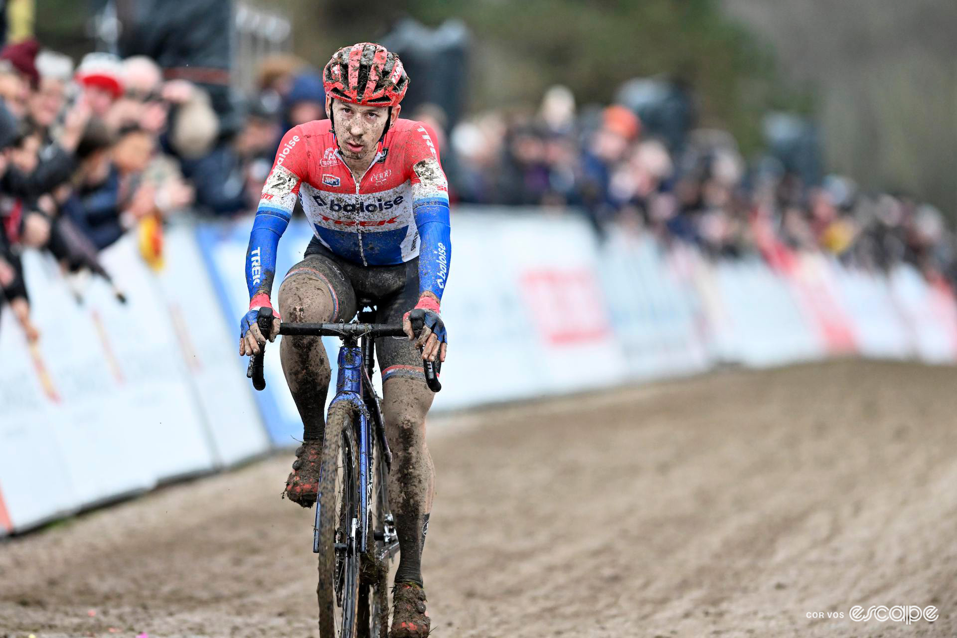 Lars van der Haar crosses the finish line looking weary at Cyclocross world cup Flamanville.