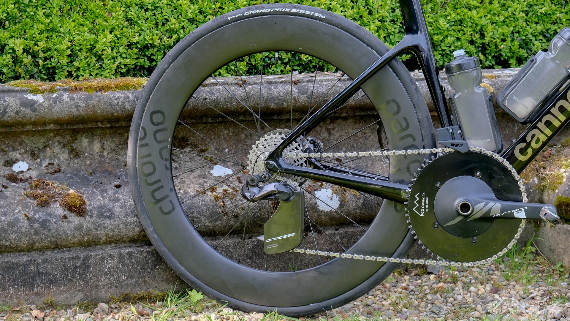 The image shows the rear Parcours Chrono wheel with Classified Powershift hub, CeramicSpeed OSPW Aero, and Miche Pistard Air cranks on the optimised Cannondale SuperSix Evo Hi-Mod 2 built for the Ras Tailteann stage race.