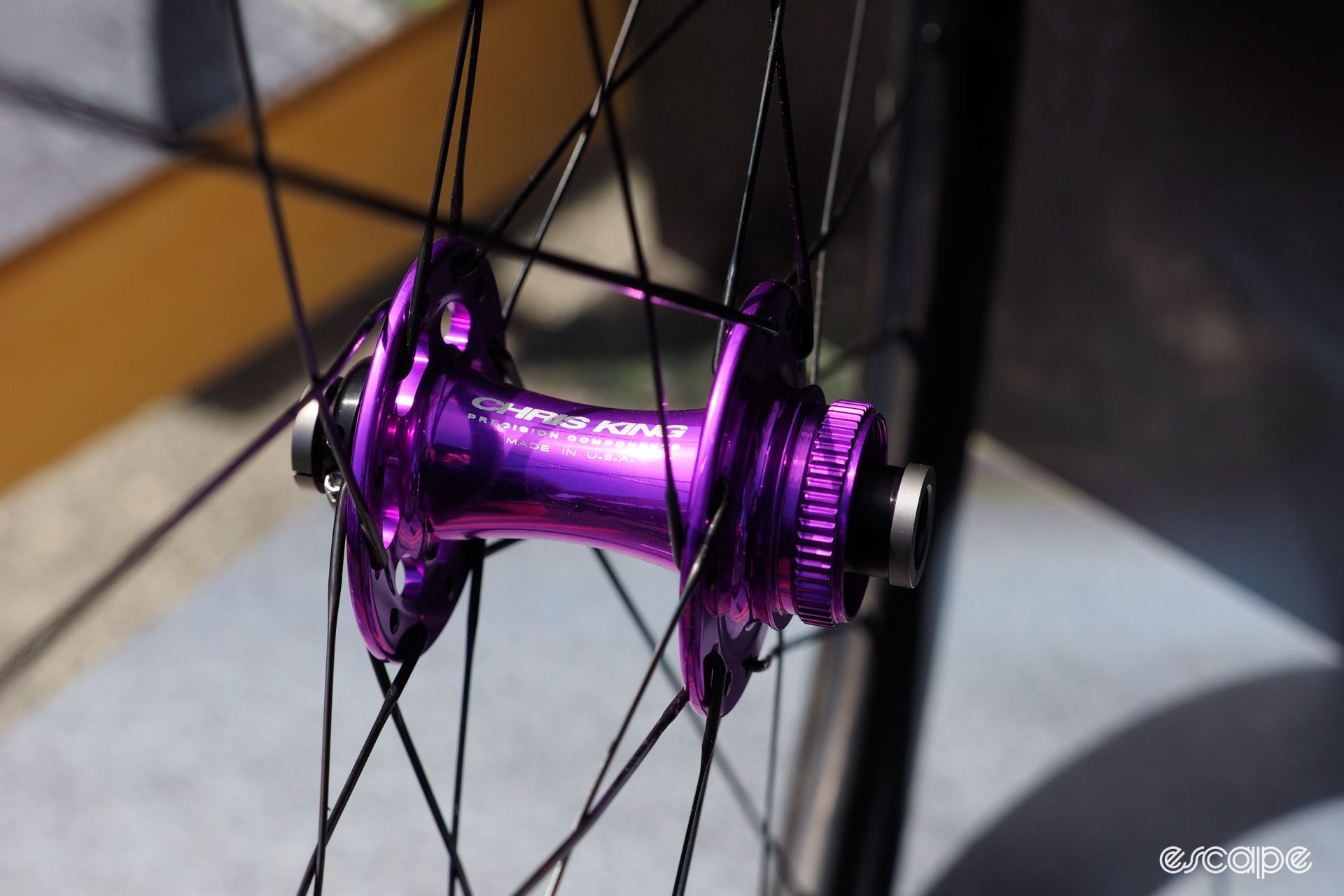 Purple Chris King R45D front hub