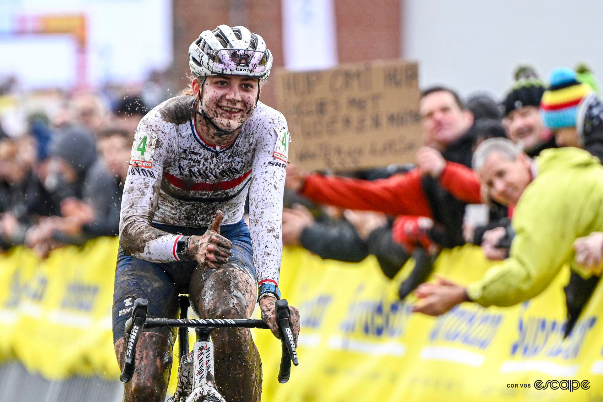 Zoe Backstedt gives a thumbs up as she wins Hexia Cyclocross Gullegem.