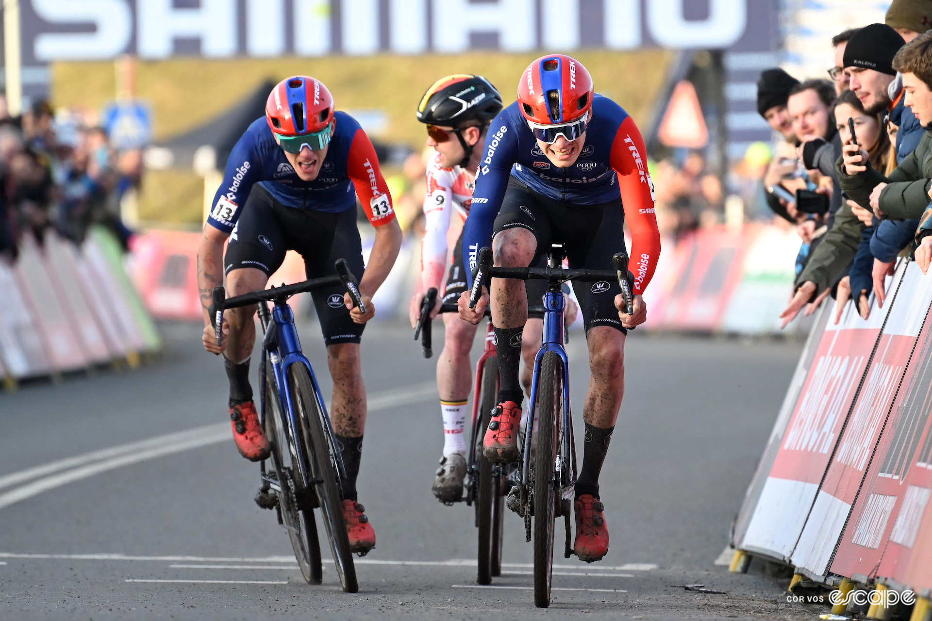 Head-on shot of Pim Ronhaar out-sprinting Thibau Nys and Eli Iserbyt at CX World Cup Hoogerheide.