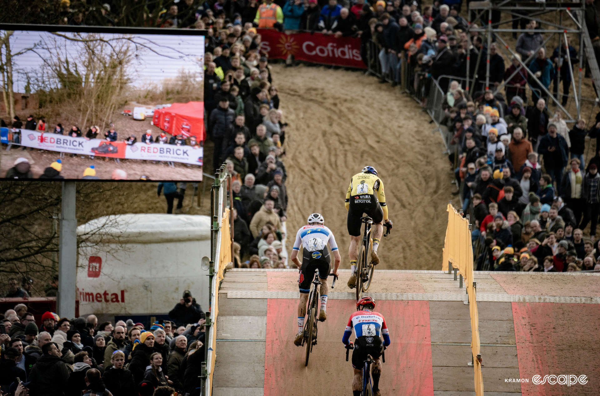 Wout van Aert, Michael Vanthourenhout and Lars van der Haar crest the bridge during X2O Trofee Koksijde - Vlaamse Duinencross.