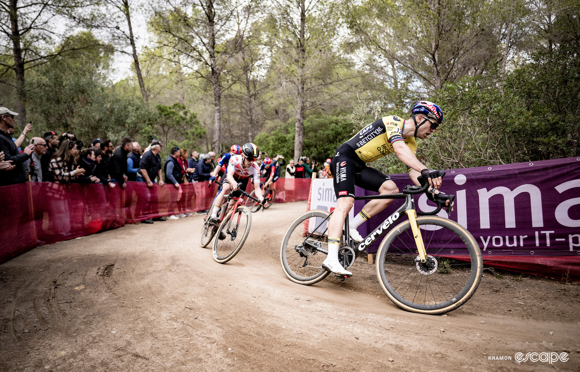 Wout van Aert leads Eli Iserbyt through a corner during CX World Cup Benidorm.