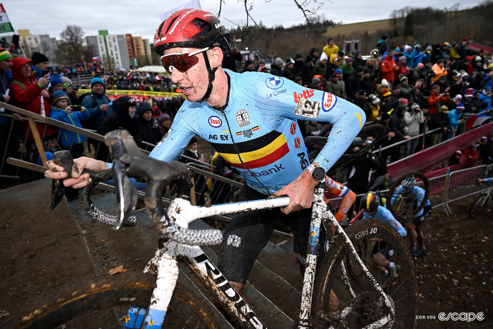 Belgian Michael Vanthourenhout runs the stairs in the fading light during the 2024 Cyclocross World Championships in Tábor.