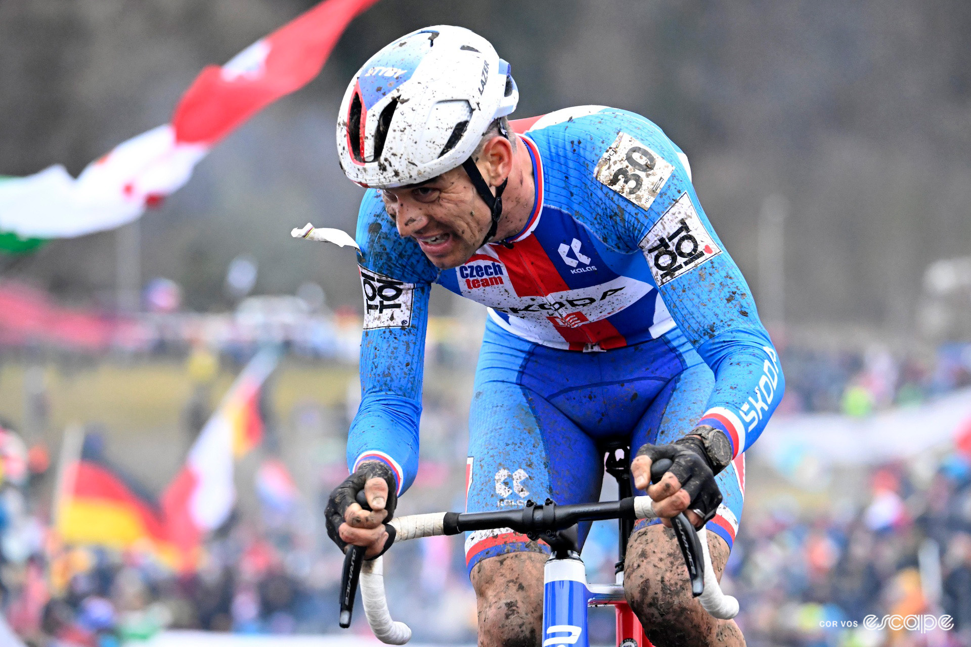 A mud-splattered Zdeněk Štybar during the 2024 Cyclocross World Championships in Tábor.