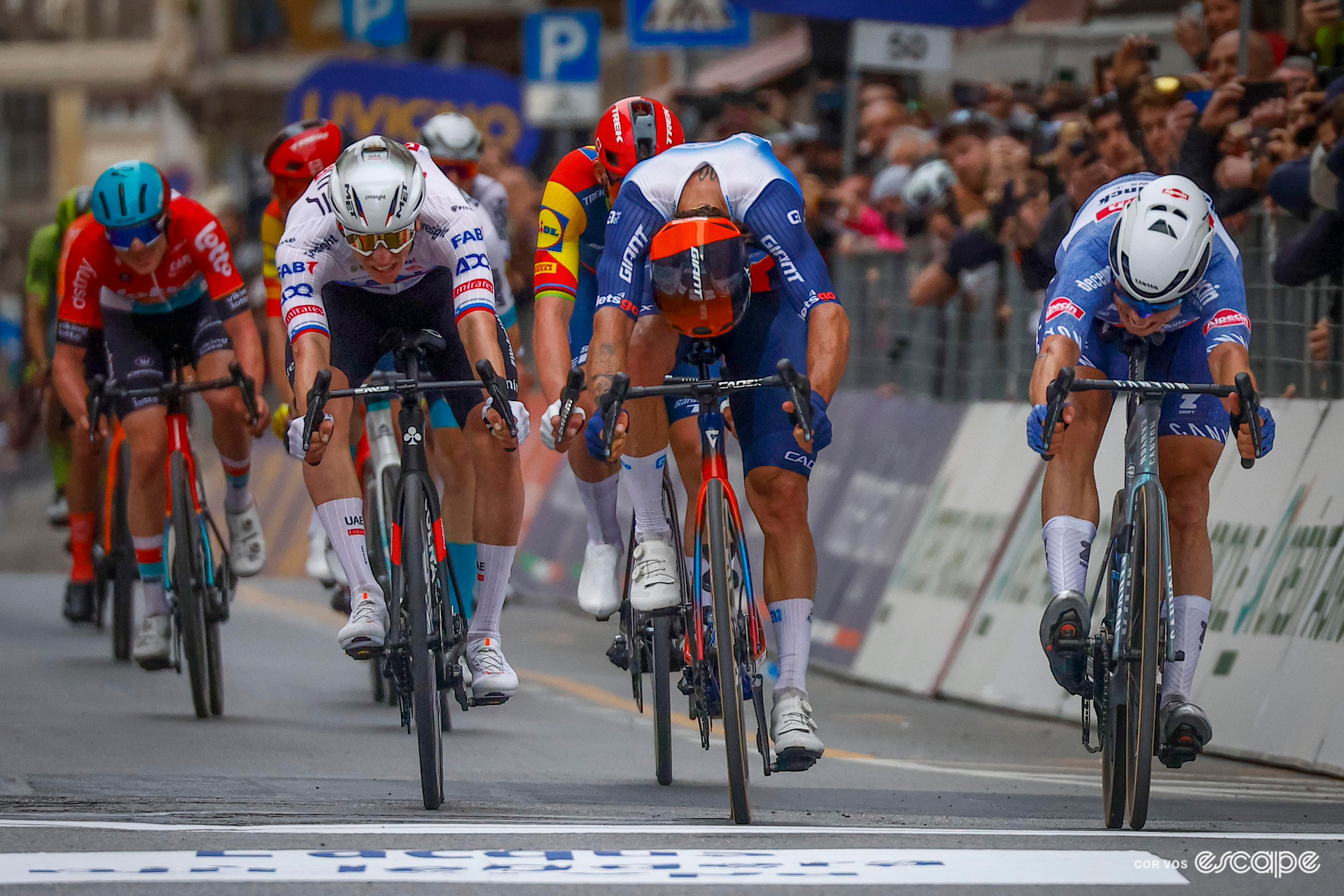 Head-on shot of the Milan-San Remo sprint finish with left to right: Tadej Pogačar, Michael Matthews and Jasper Philipsen.