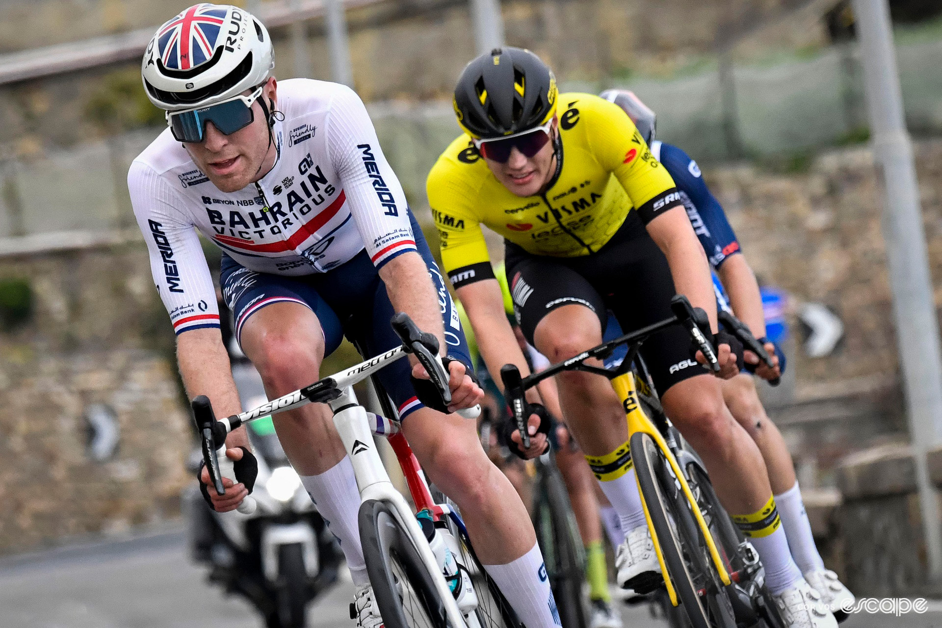 British national champion Fred Wright leads Olav Kooij during Milan-San Remo 2024.