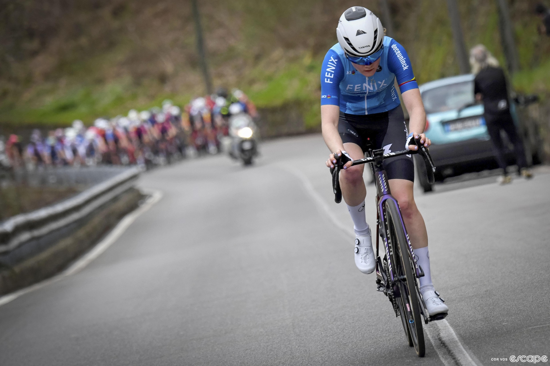 Puck Pieterse rides some ways ahead of the peloton during a race in Italy