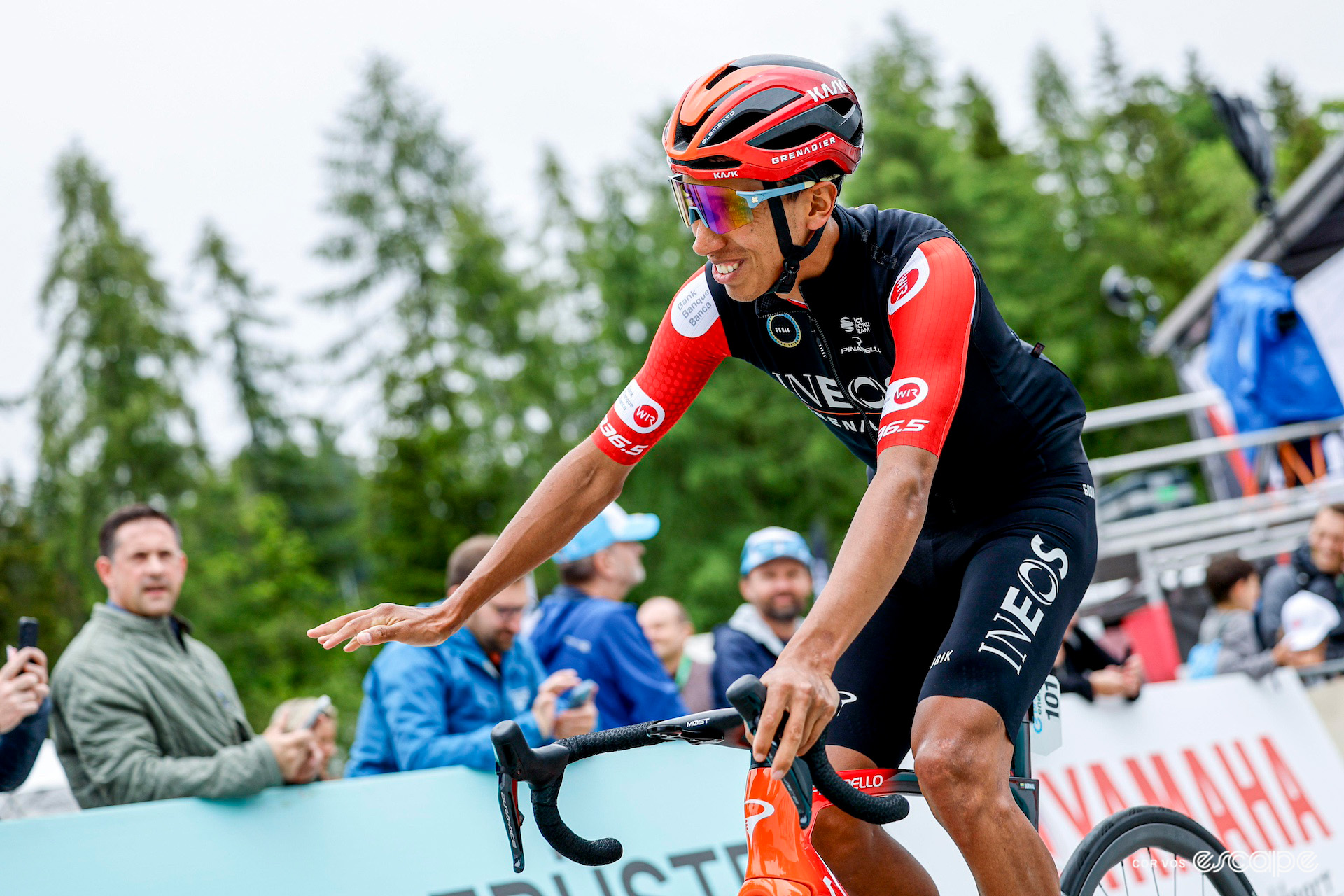 Egan Bernal waves to fans before the start of stage 7 of the 2024 Tour de Suisse.