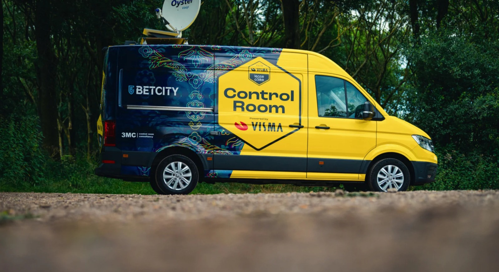 Side of Visma-Lease a Bike's 'Control Room' van unveiled before the 2024 Tour de France.