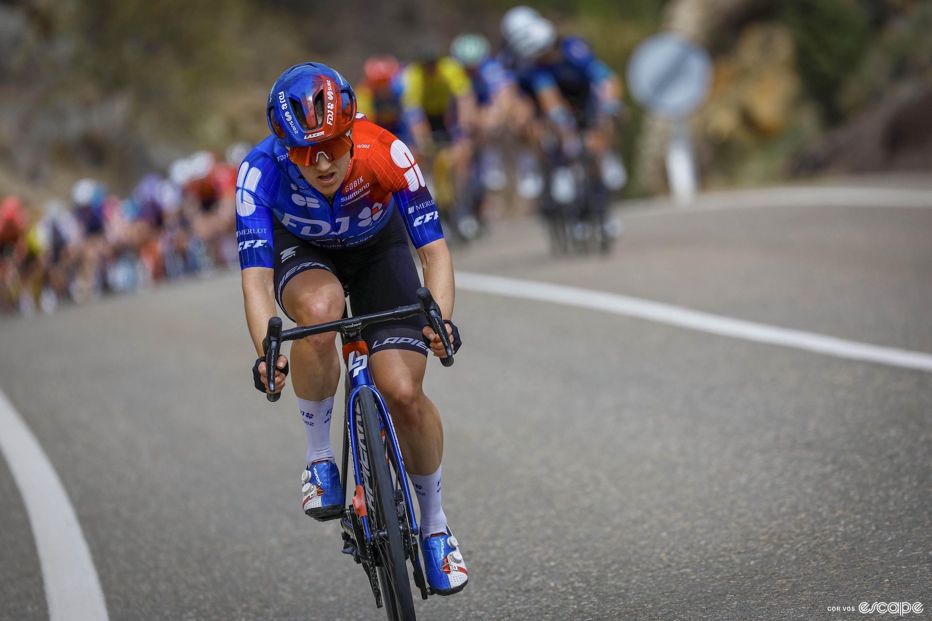 Grace Brown rides alone ahead of the peloton