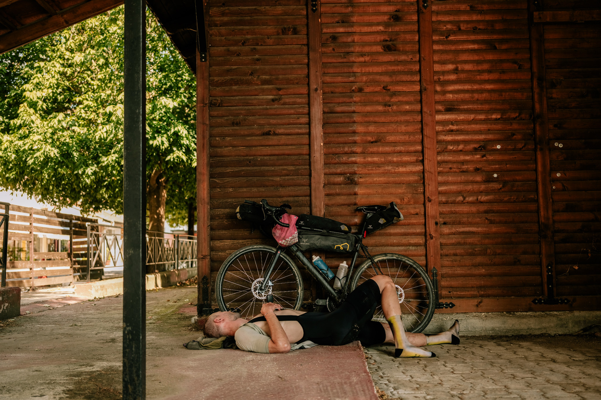 A rider rests in Rodopoli, Greece (Credit: Liz Seabrook)