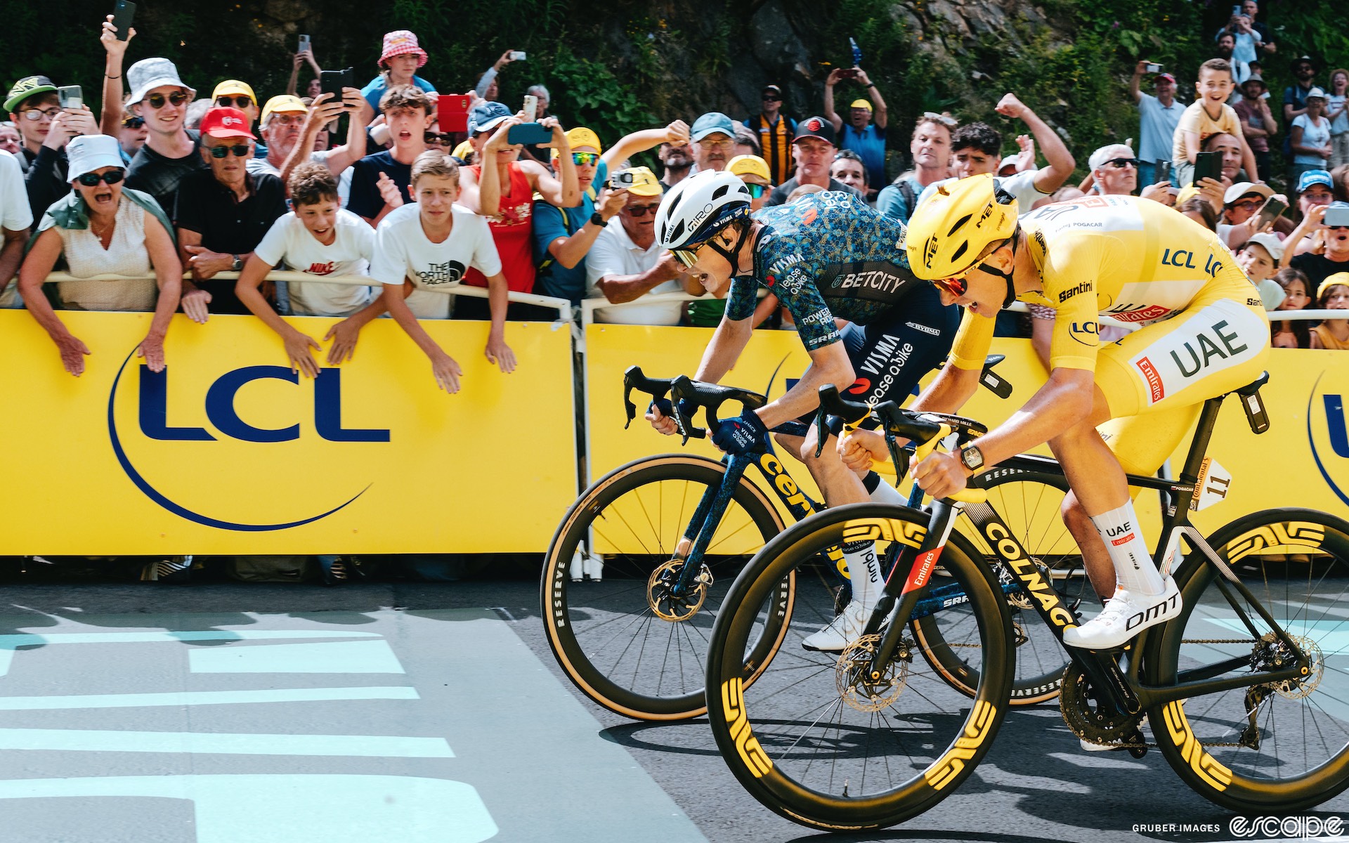 Jonas Vingegaard pips Tadej Pogačar to win stage 11 of the Tour de France.