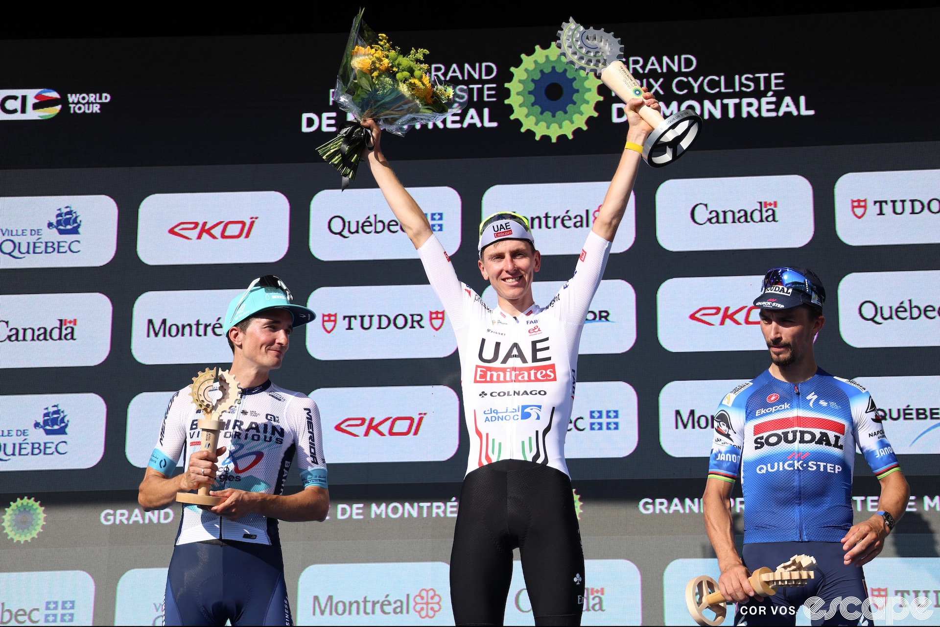 Tadej Pogačar flanked by Pello Bilbao and Julian Alaphilippe on the GP Montréal podium.