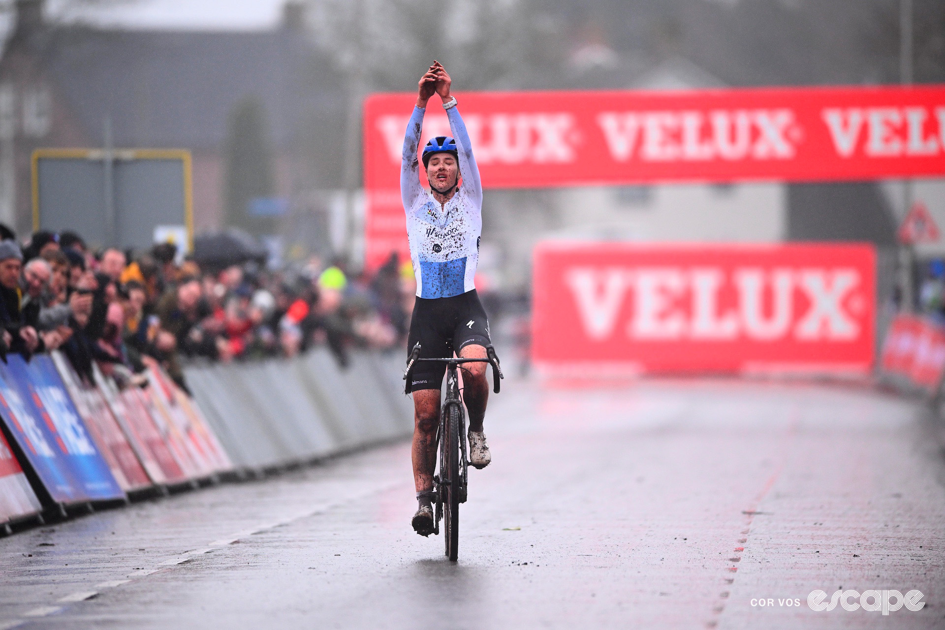 Marie Schreiber wearing the under-23 World Cup leader's jersey crosses the finish line victorious at World Cup Hulst.