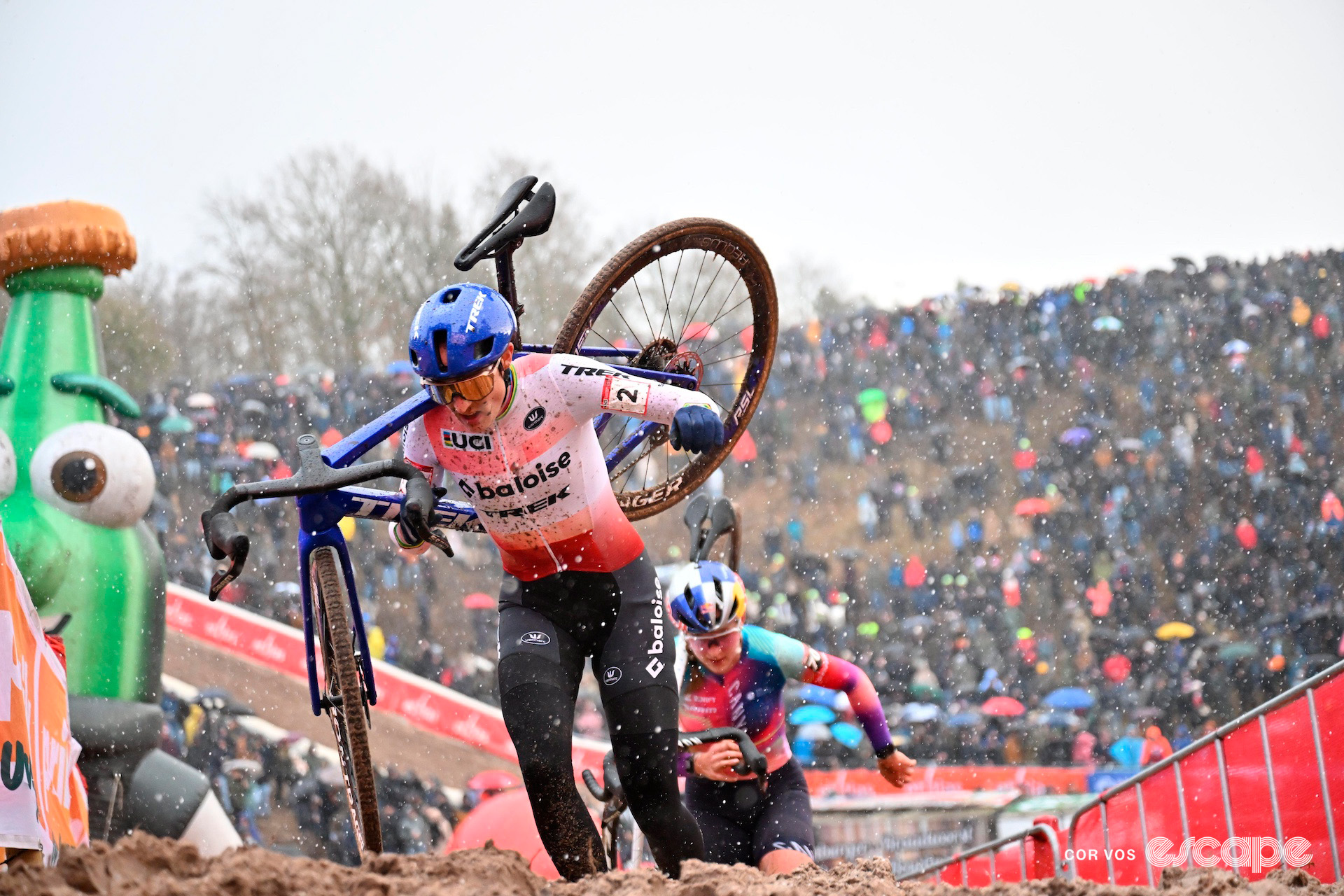 Elite women's World Cup leader Lucinda Brand, pursued by Zoe Backstedt, during cyclocross World Cup Zonhoven.