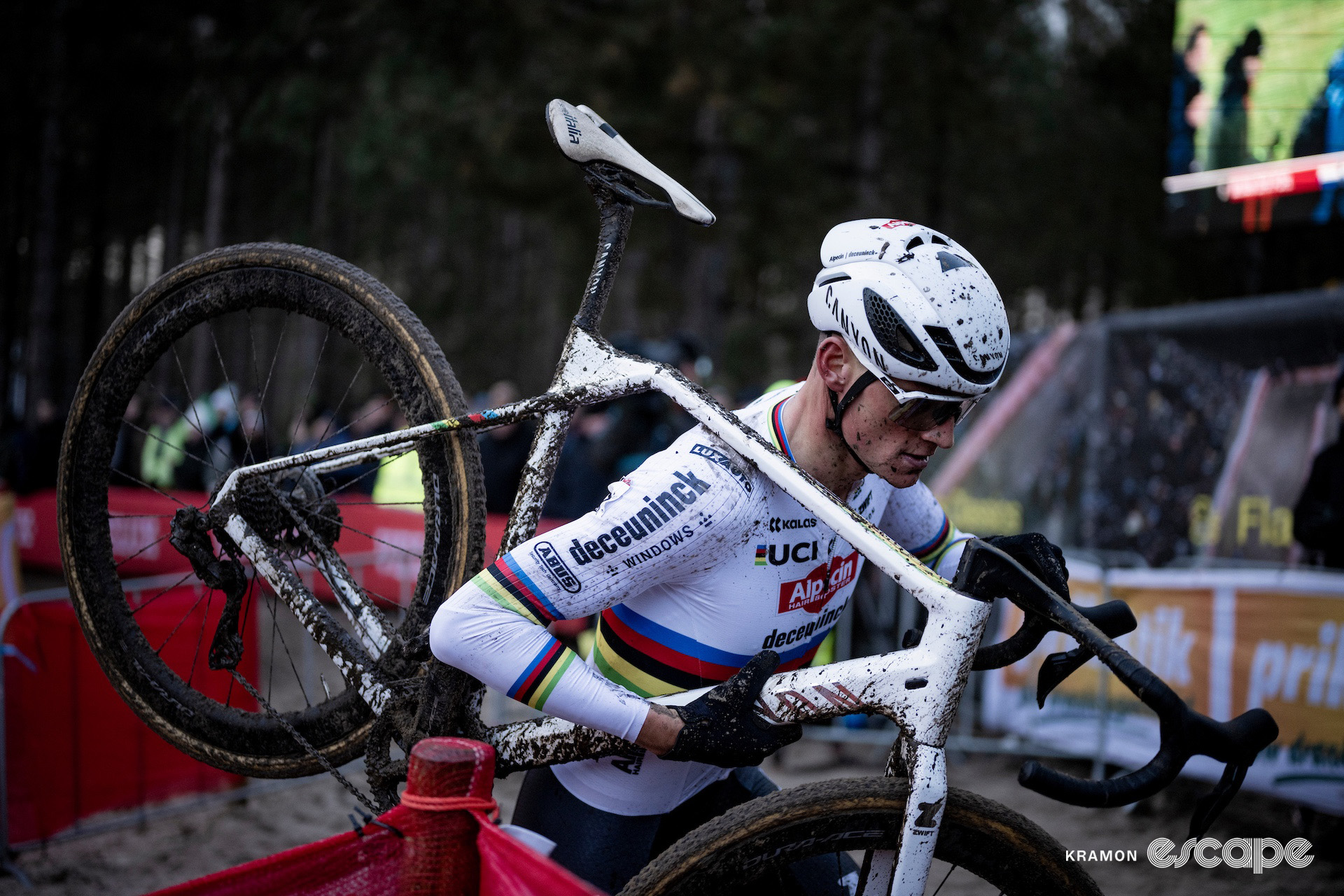 Mathieu van der Poel runs with his bike during cyclocross World Cup Zonhoven.