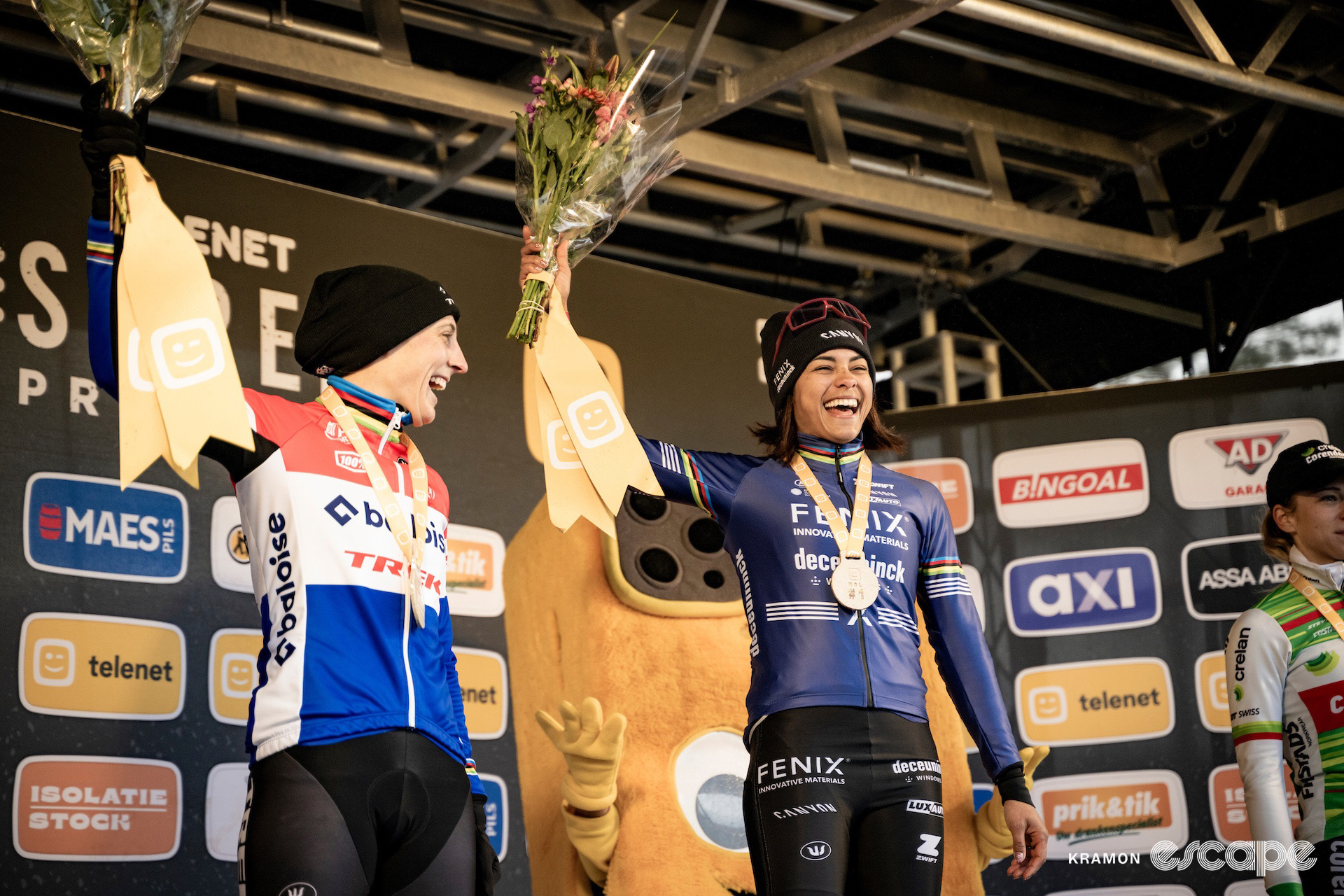 Lucinda Brand and Ceylin del Carmen Alvarado on the elite women's podium at cyclocross event Superprestige Mol.