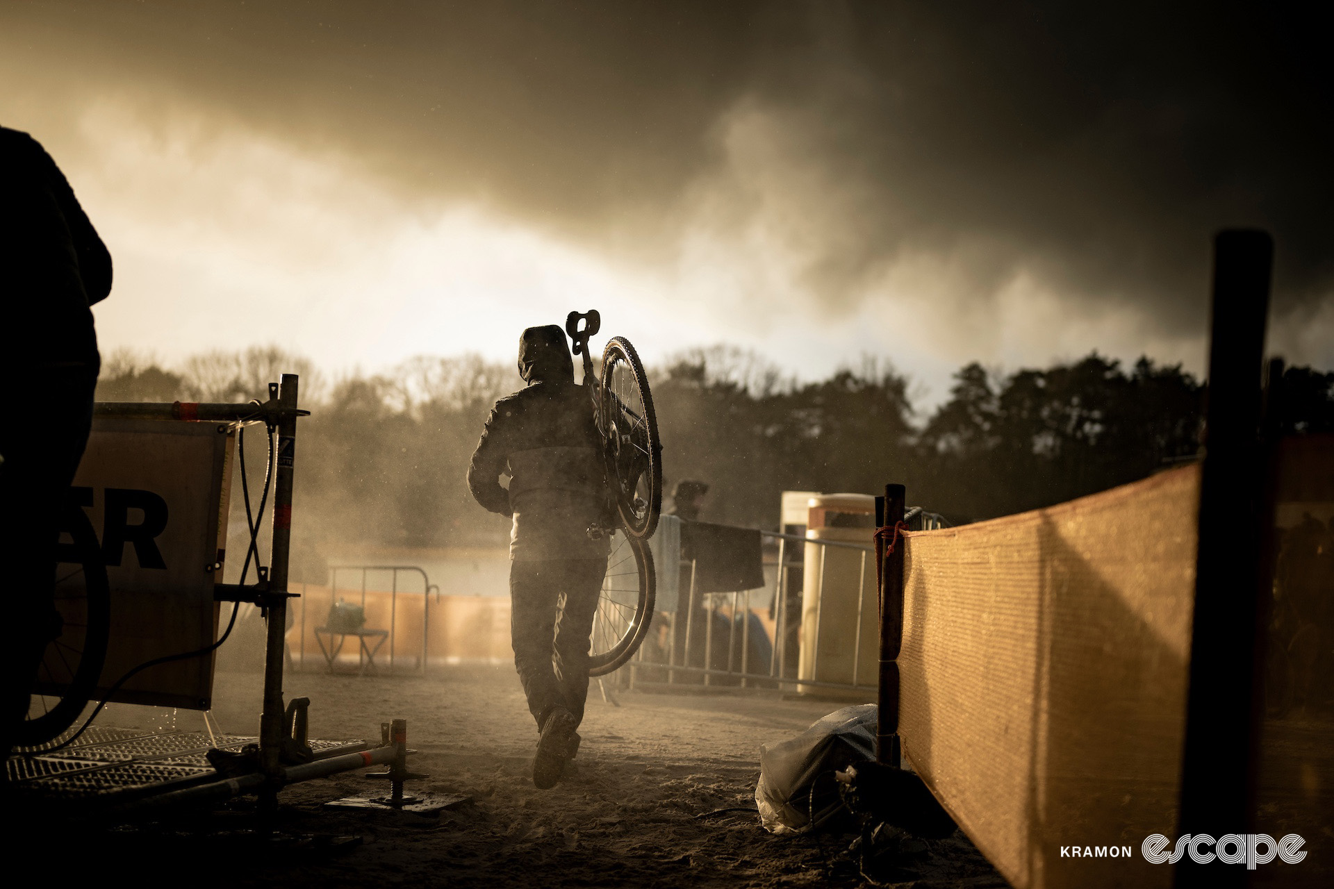 A mechanic carries a bike clean during cyclocross event Superprestige Mol.