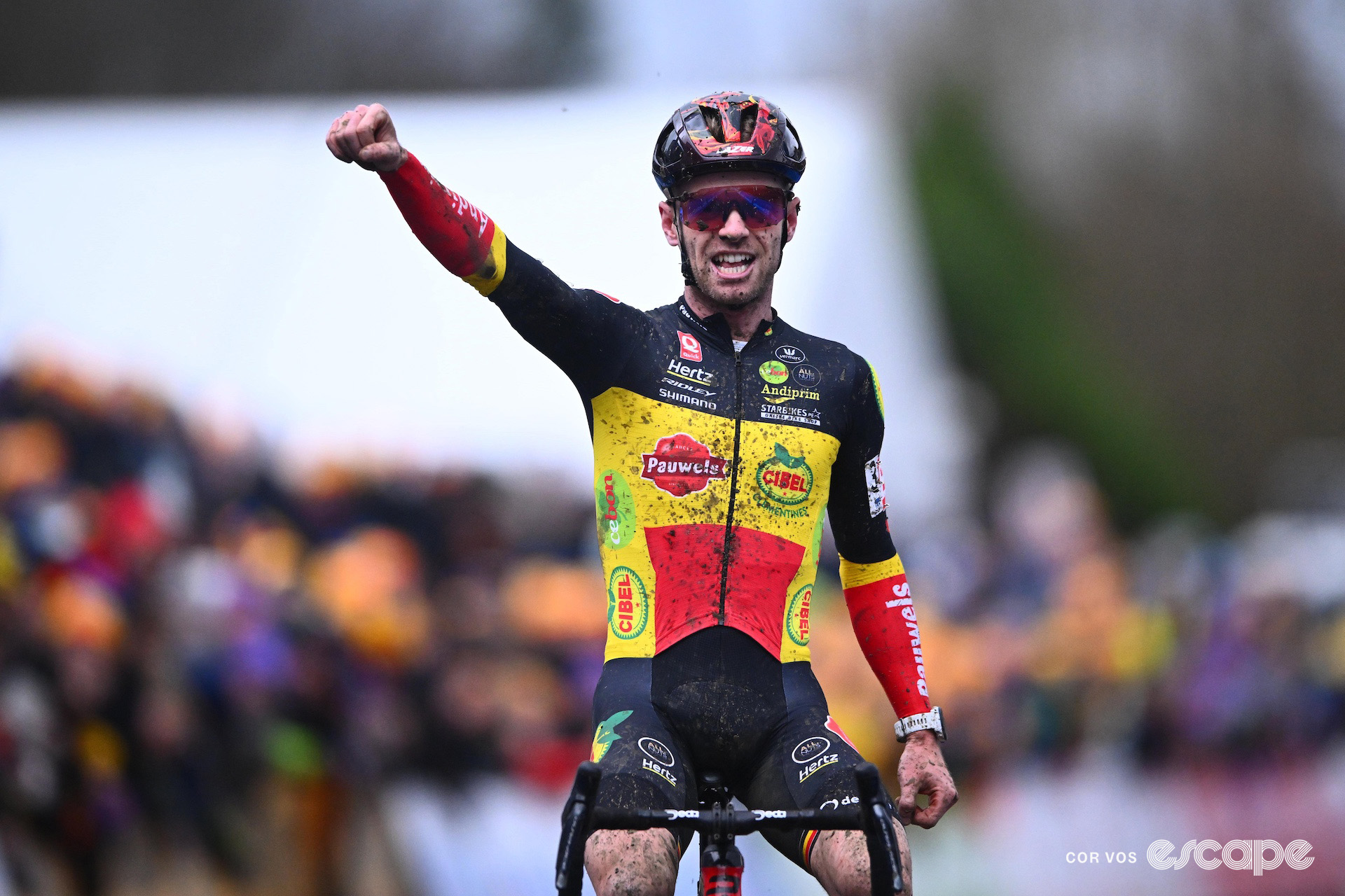 Eli Iserbyt punches the air in victory at GP Sven Nys.