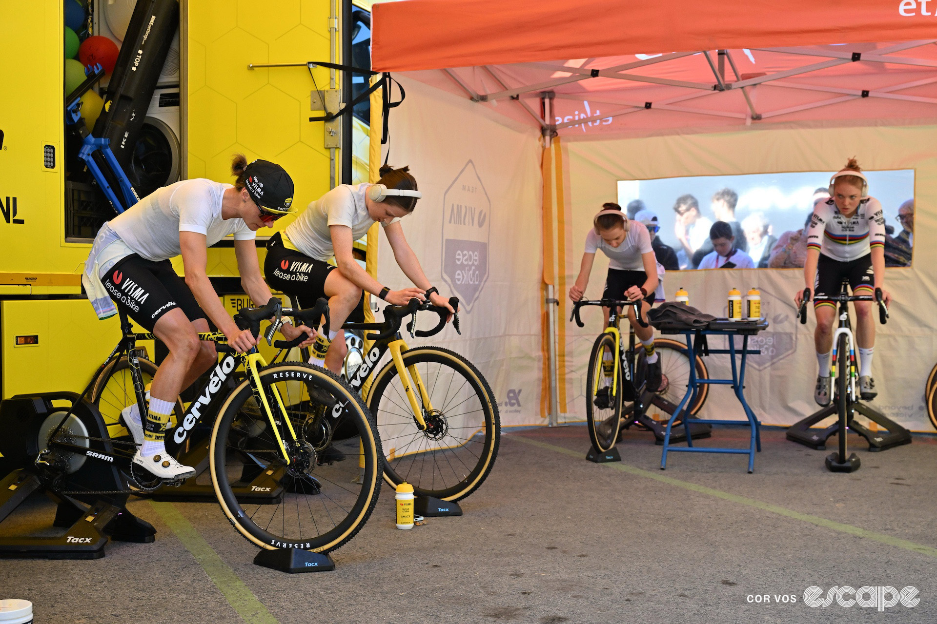 Marianne Vos, Viktória Chladonová, Imogen Wolff and world champion Fem van Empel warm up on turbo trainers before cyclocross World Cup Benidorm.