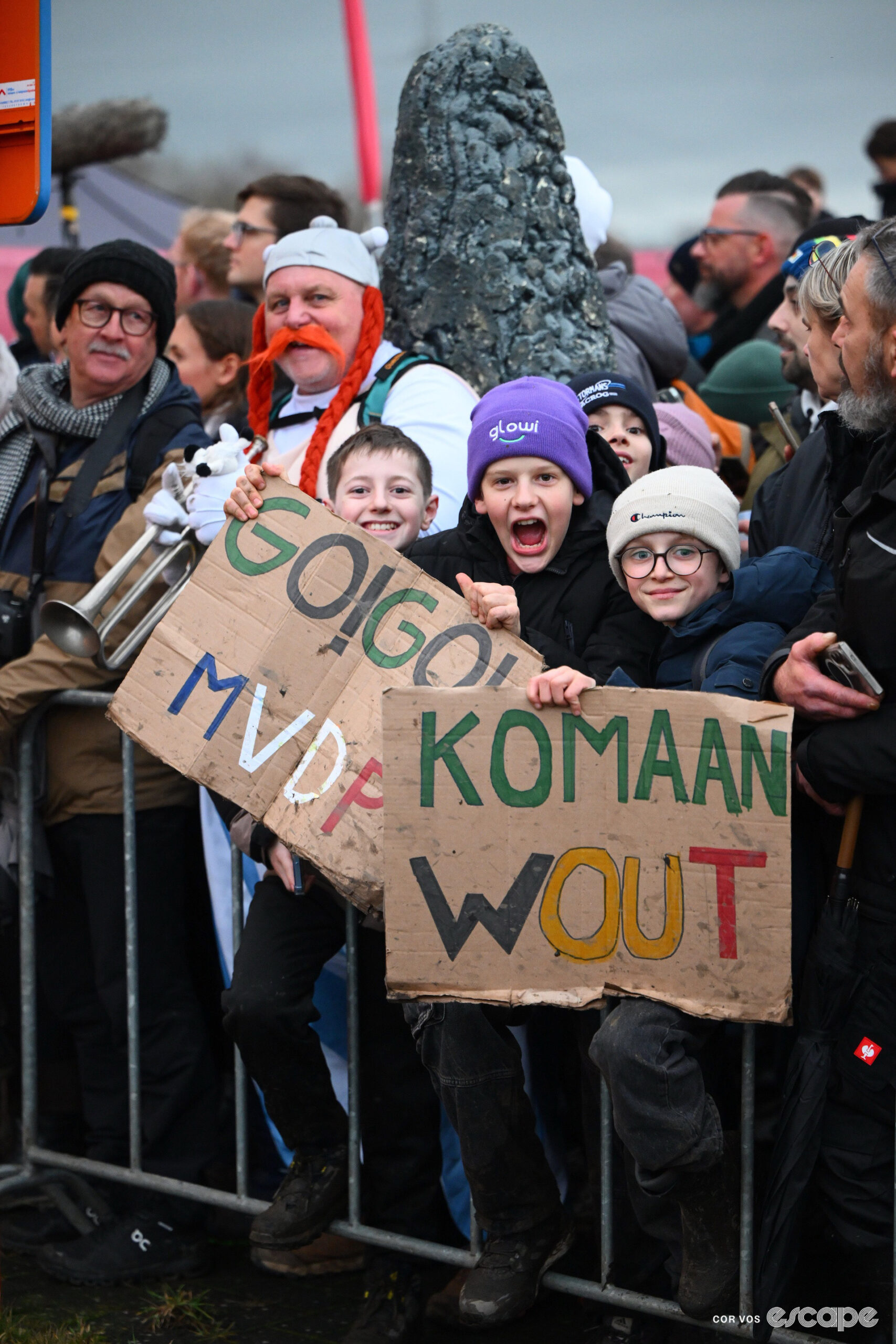 Young fans of Mathieu van der Poel and Wout van Aert brandish their homemade banners during cyclocross World Cup Maasmechelen.