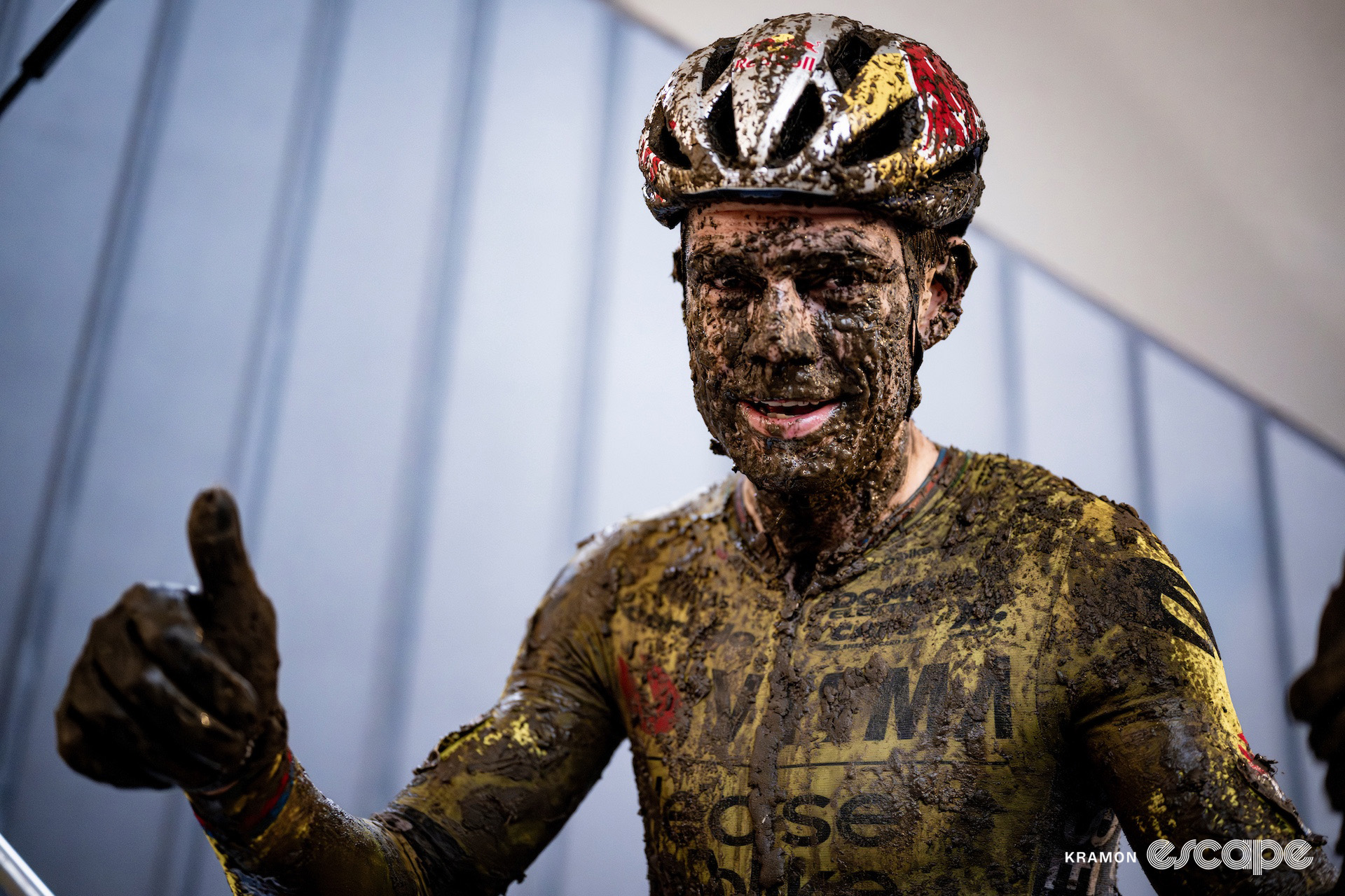 Wout van Aert gives a thumbs up covered in mud after World Cup Dendermonde.