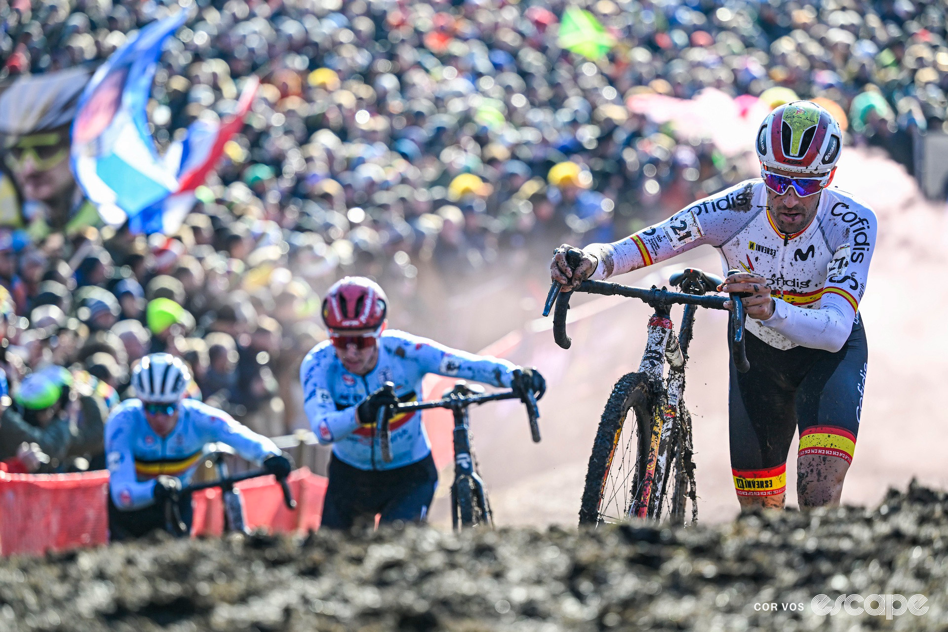 Spain's Felipe Orts leads Belgians Michael Vanthourenhout and Laurens Sweeck during the 2025 elite men's cyclocross World Championships.