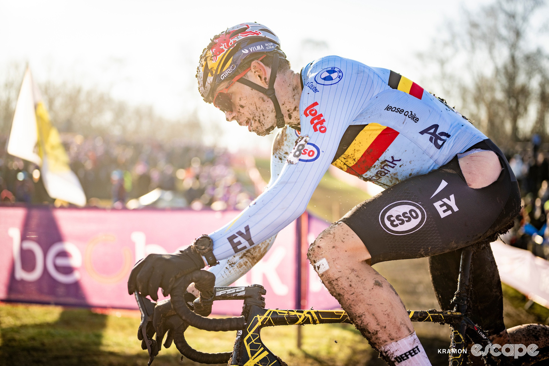 Wout van Aert during the 2025 elite men's cyclocross World Championships, a large hole in the left hip of his shorts revealing the bad luck he suffered early in the race.