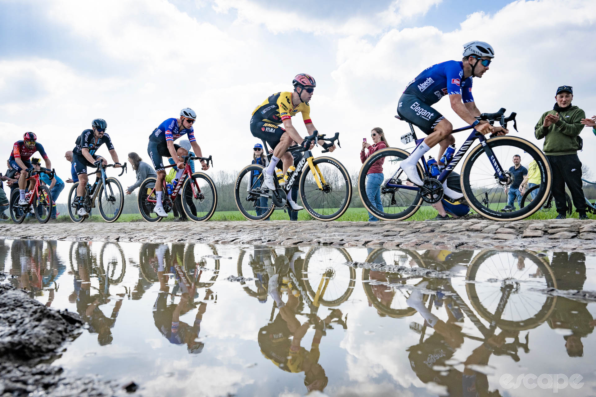 Riders on the Paris-Roubaix cobbles in 2023.
