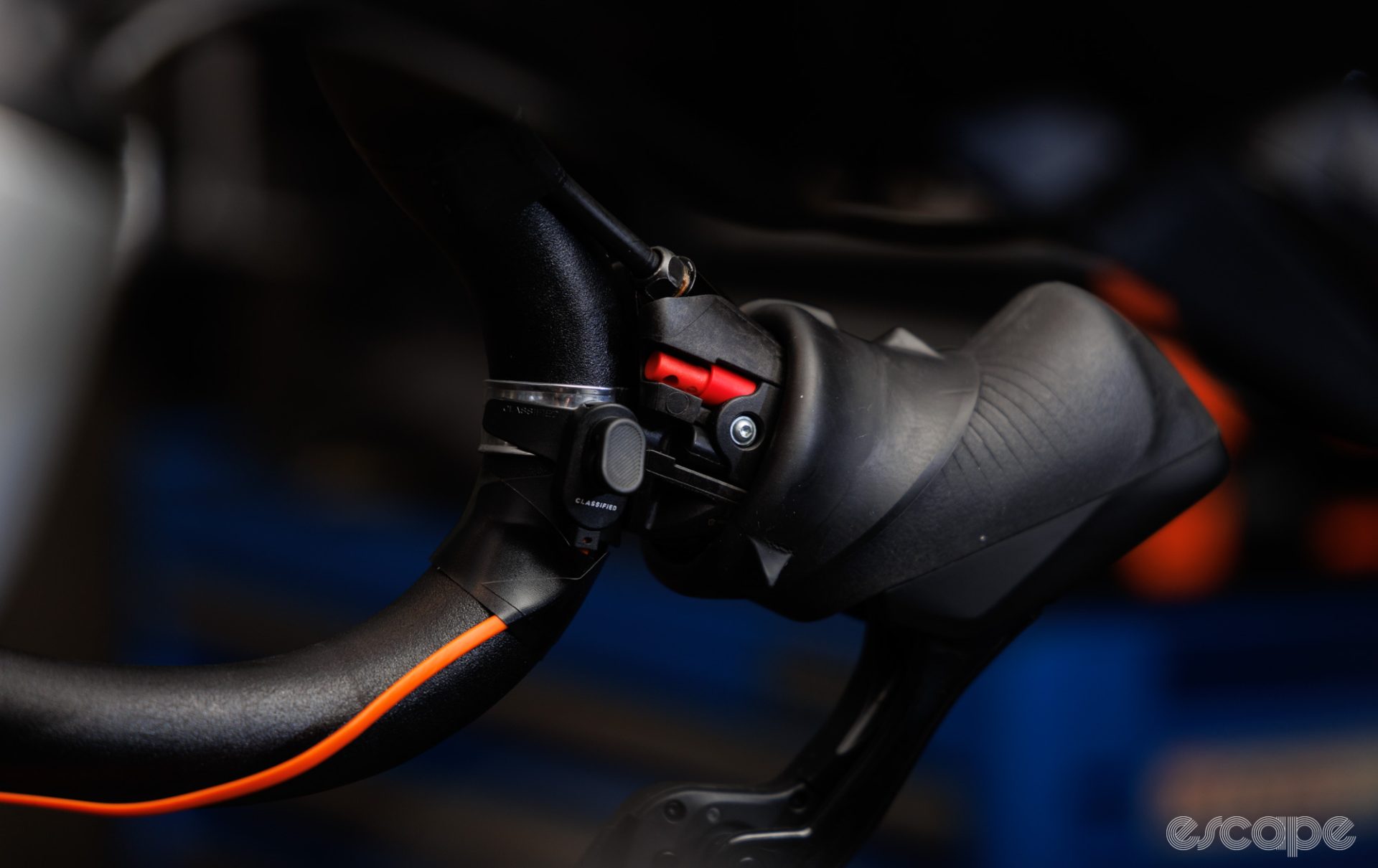 The sprint shifter is placed under the bar tap and wired to the wireless transmitter at the bar end.