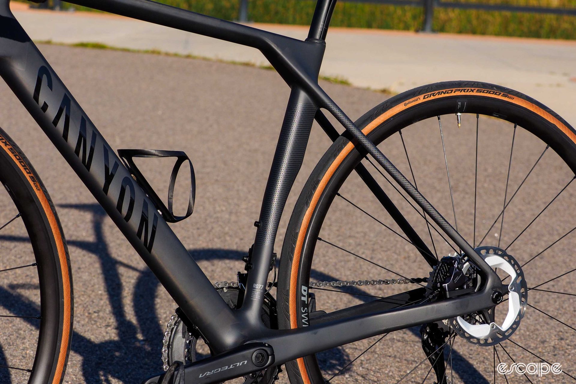 As the 2024 Canyon Endurace CF rear triangle shows, a primary focus is rider comfort without the expense of efficiency. Large chainstays and thin seatstays balance rigidity and ride quality.