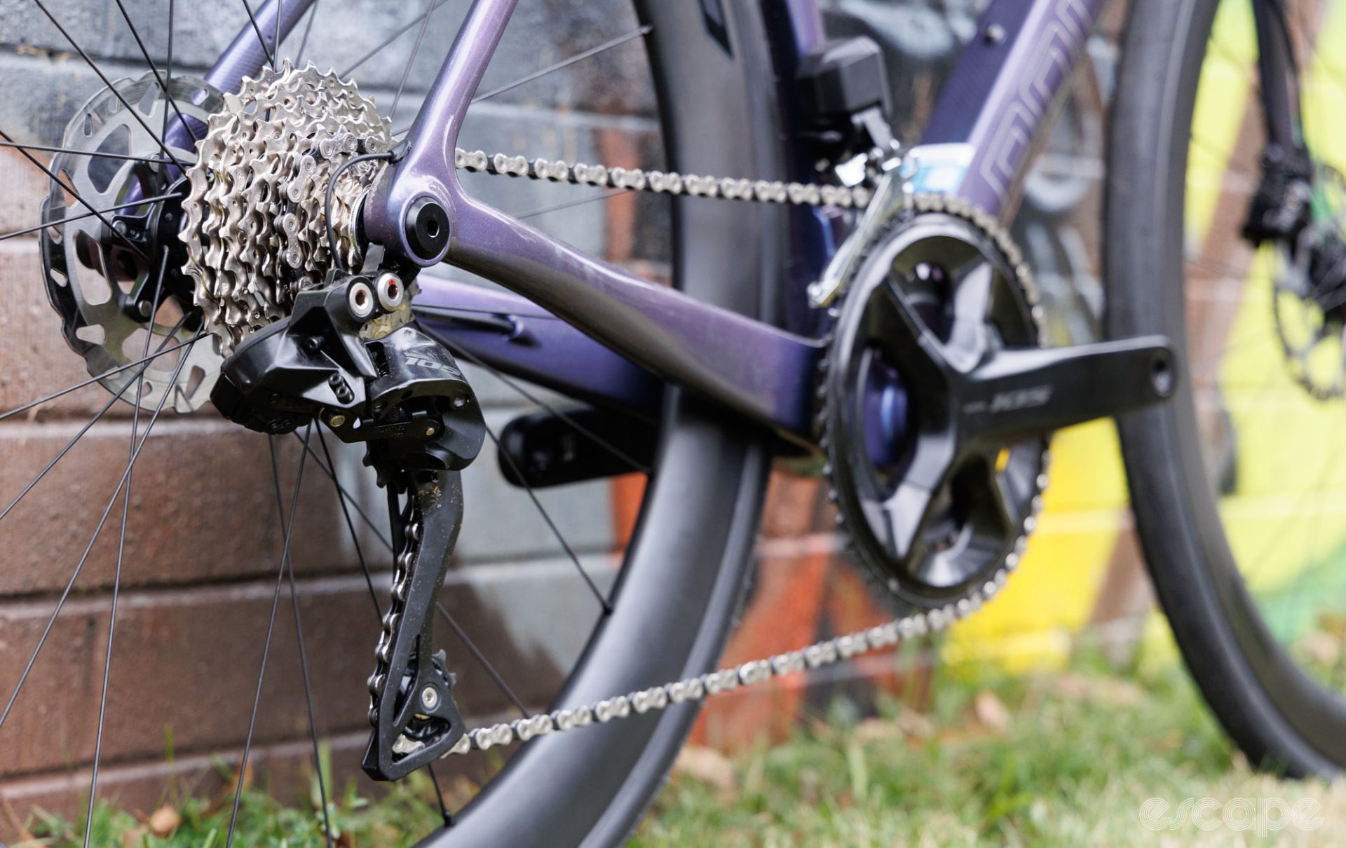 Picture showing 105 Di2 drivetrain on a bike, with focus on rear derailleur and cassette. 