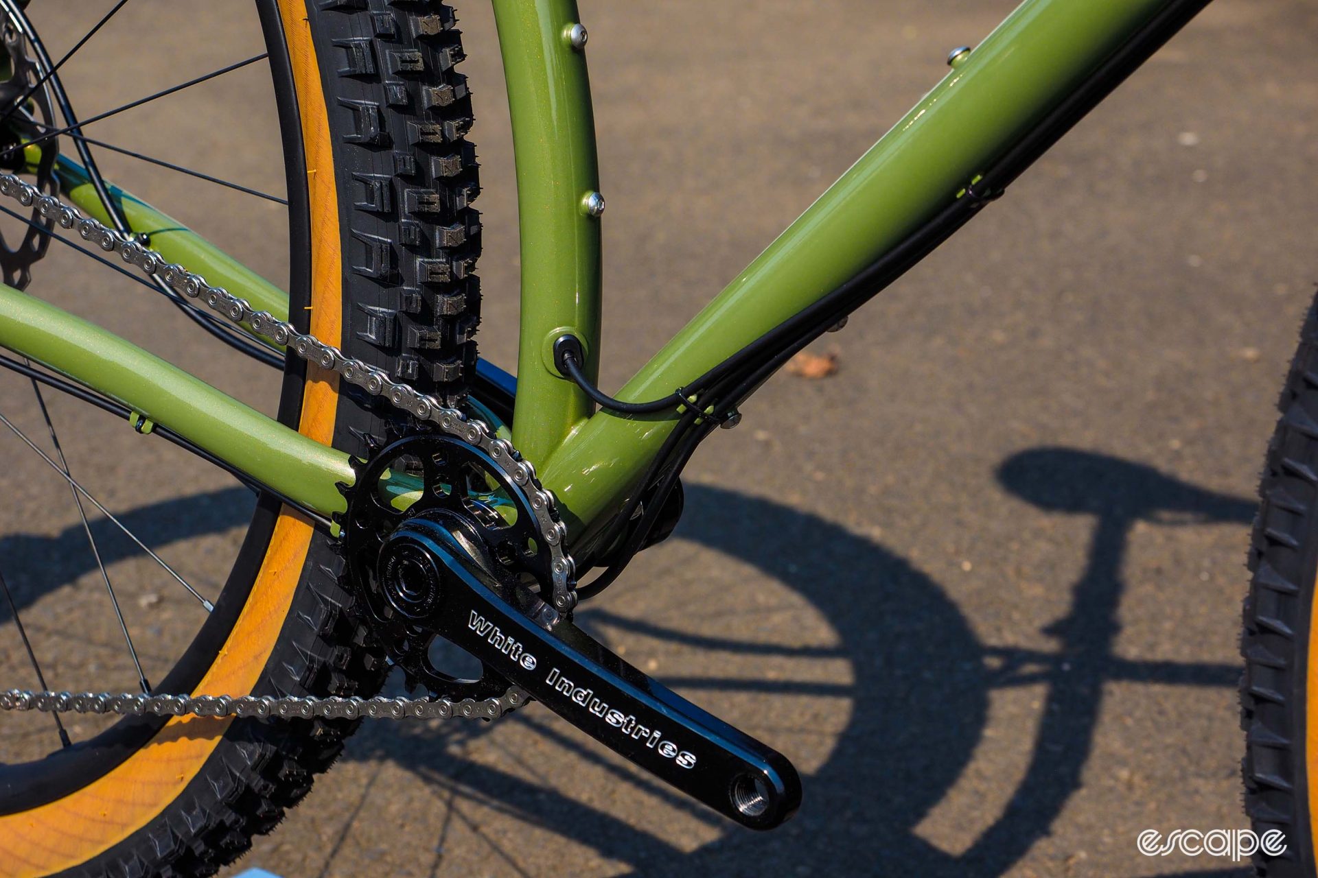 Elegant-looking cable routing on a Black Cat custom steel fully rigid 29er.