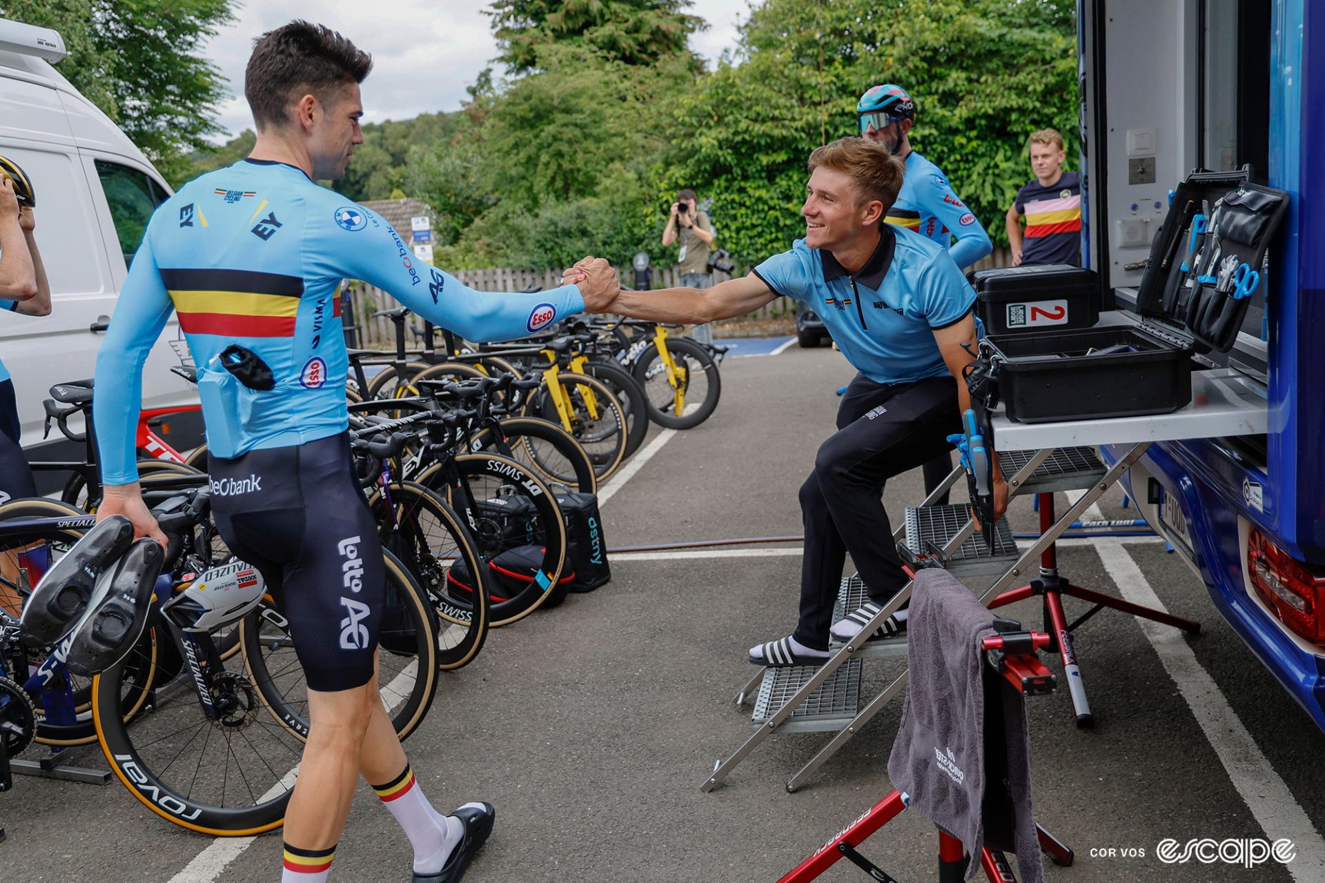 Wout van Aert engages in a hearty handshake with Remco Evenepoel during Belgian preparations for World Road Championships.