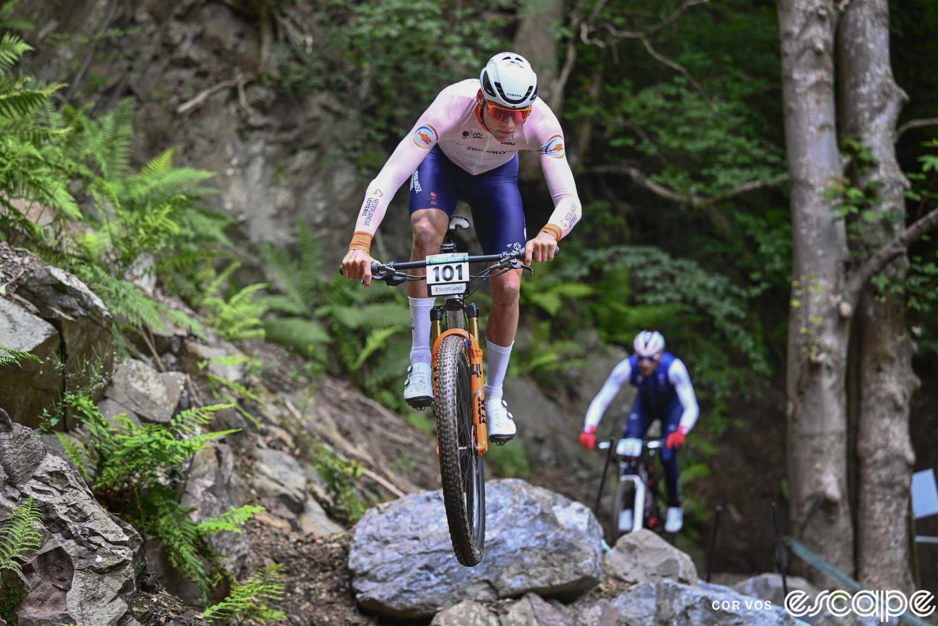 Mathieu van der Poel rides a rocky double jump in Glentress Forest in practice at the 2023 World MTB Championships.