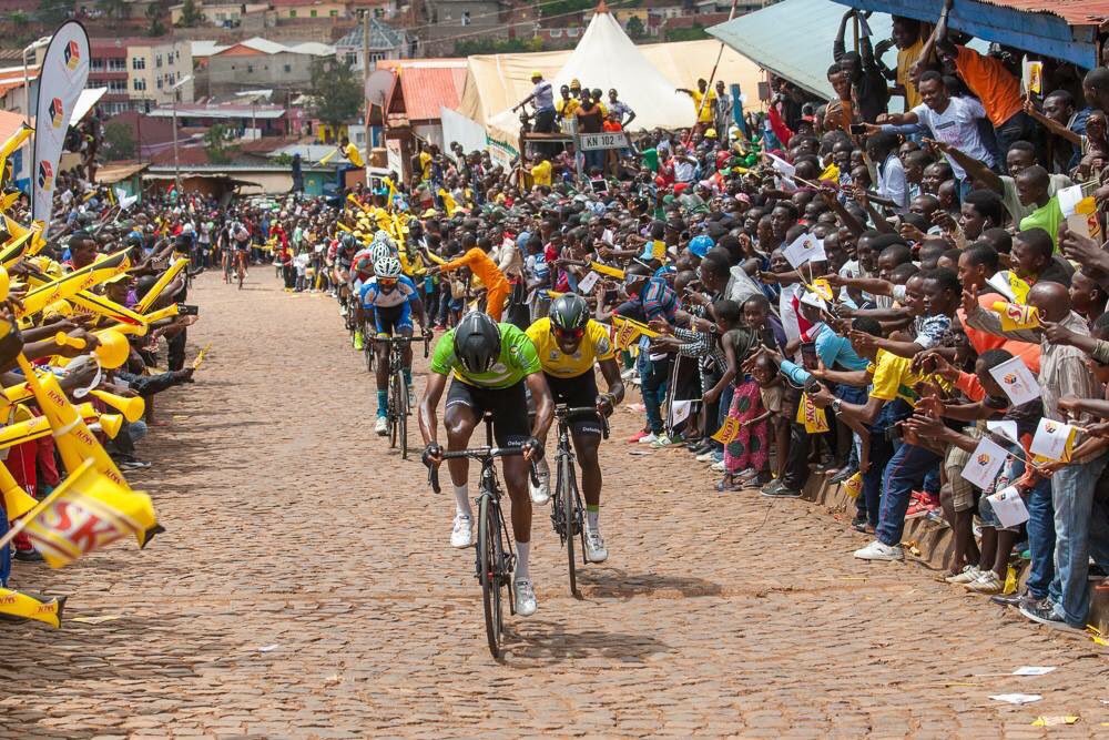 Riders crest the notoriously steep cobbled Wall of Kigali climb at the Tour du Rwanda.