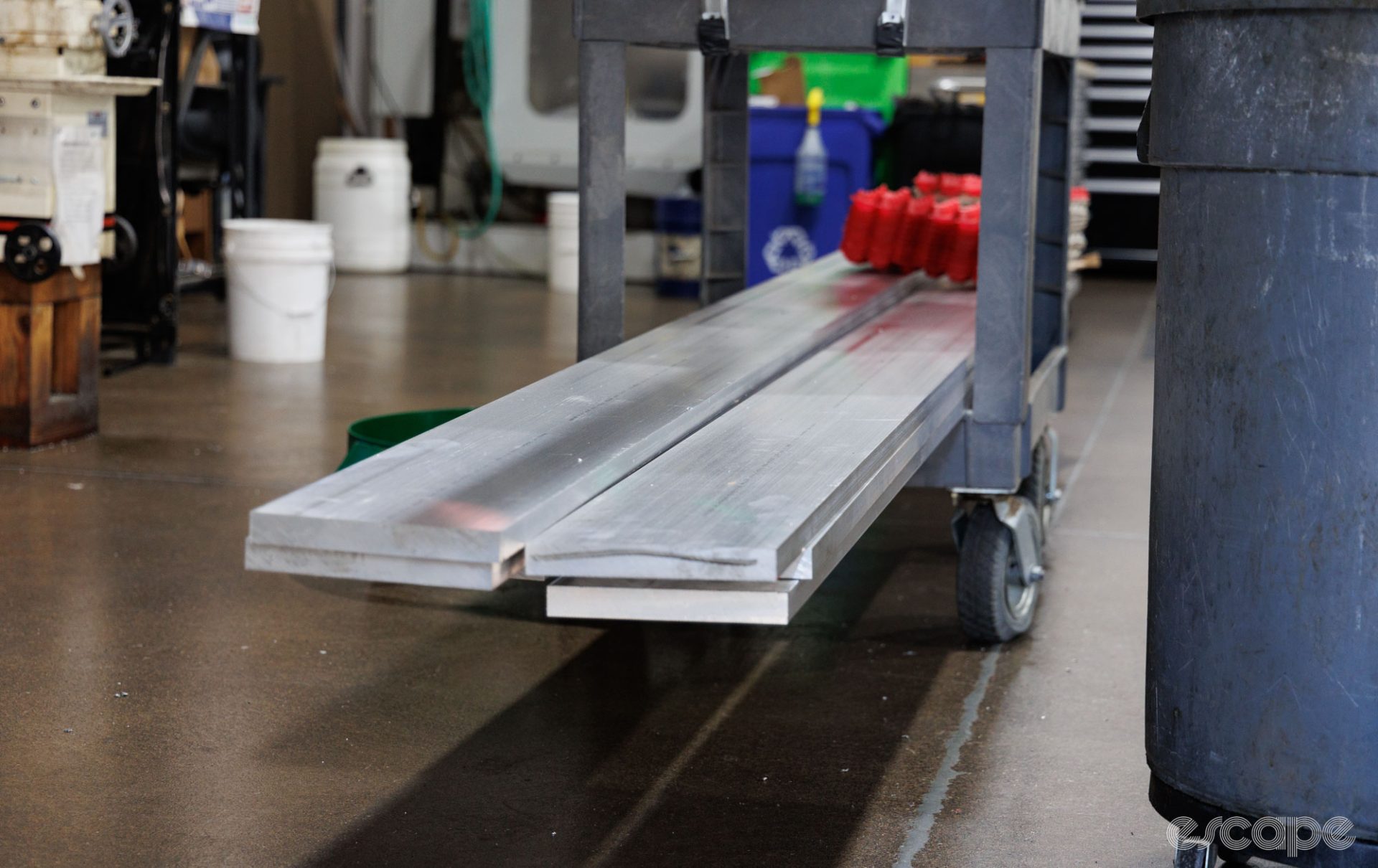 Sheets of aluminum billet sit on a cart on the Abbey factory floor.